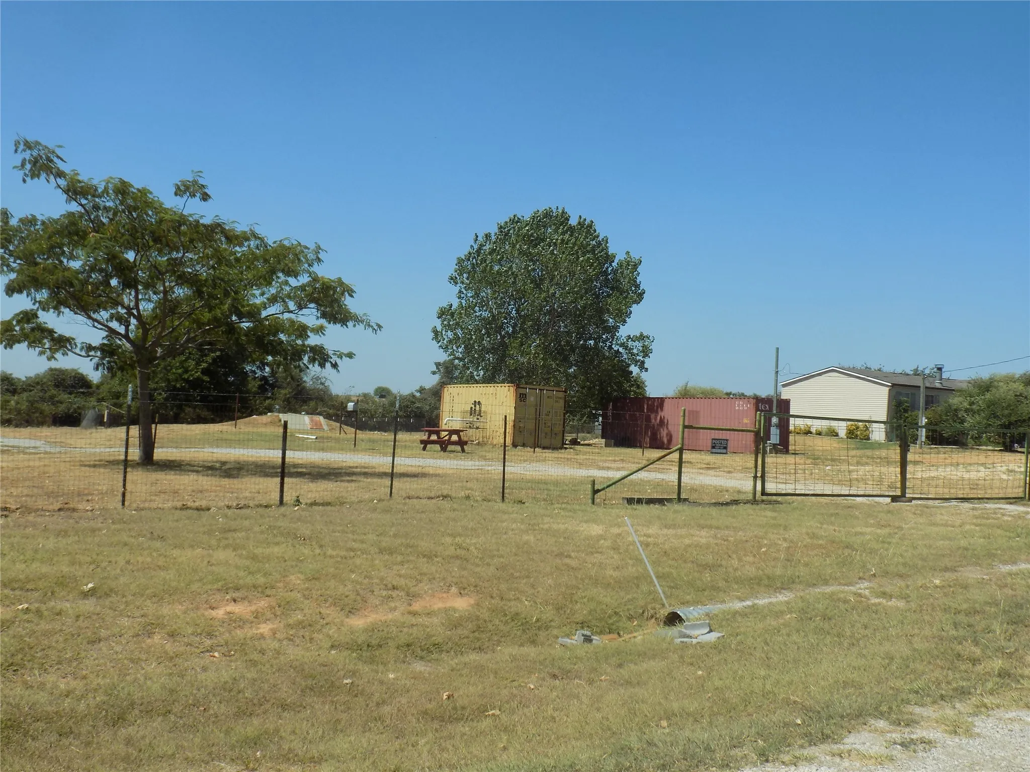 Additional amenities with a 40' container and 16-person in-ground storm shelter.