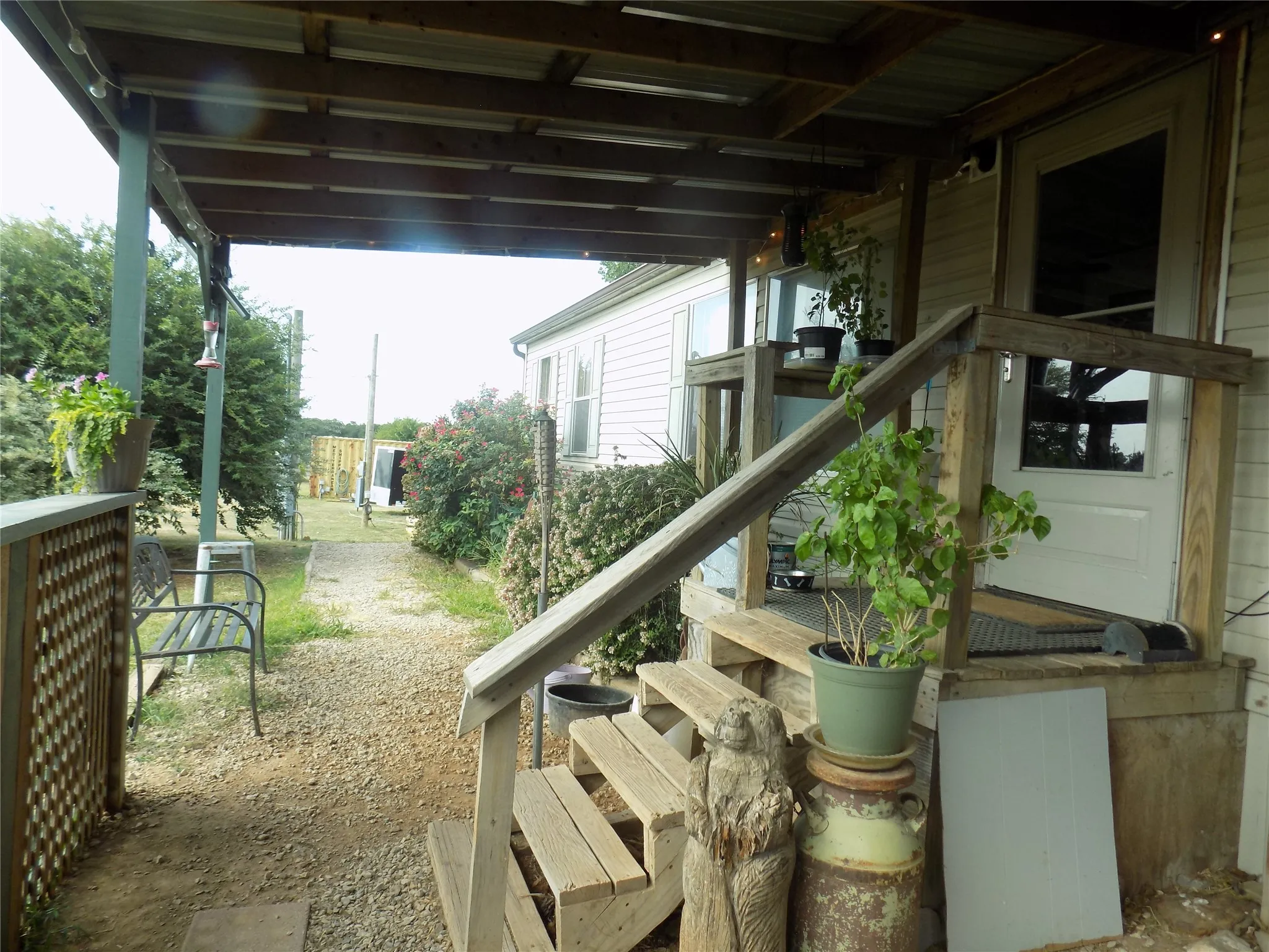 Lovely open porch area at entry.