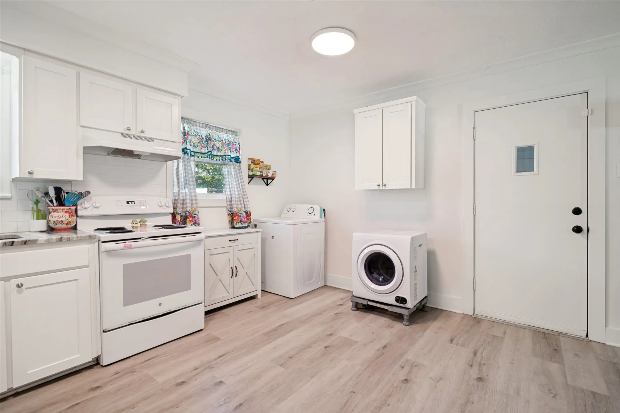 Laundry area inside the home vs the garage.  This is a great feature for older homes.