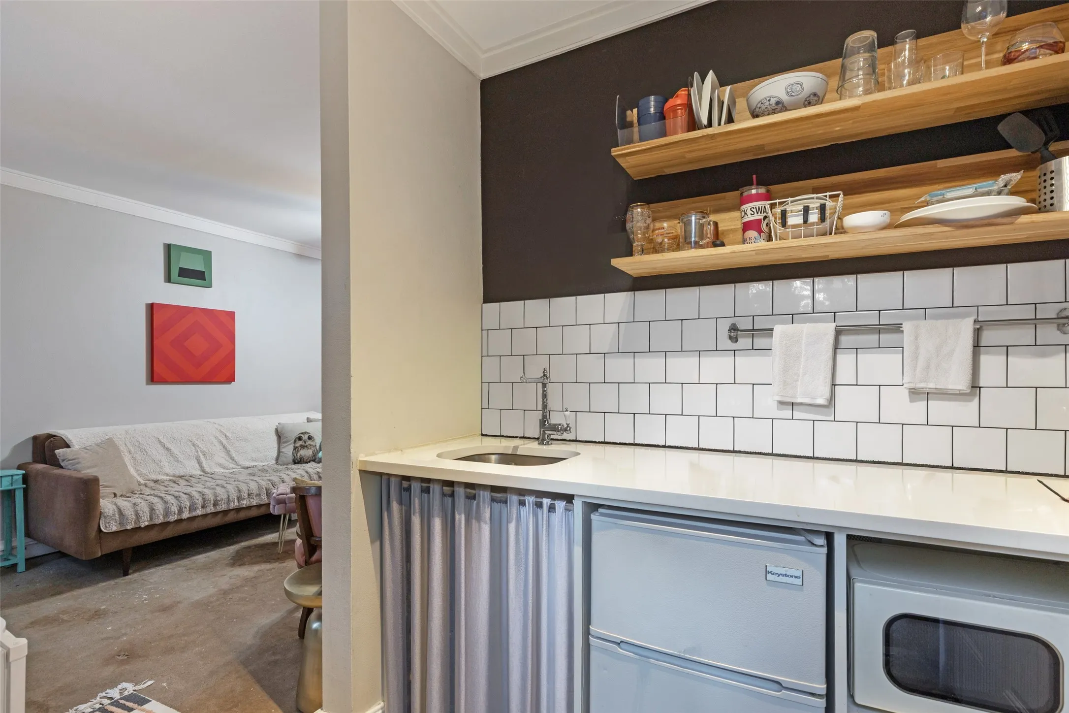 The detached Guest House includes its own Kitchenette, adding tremendous flexibility to this character-filled property.
