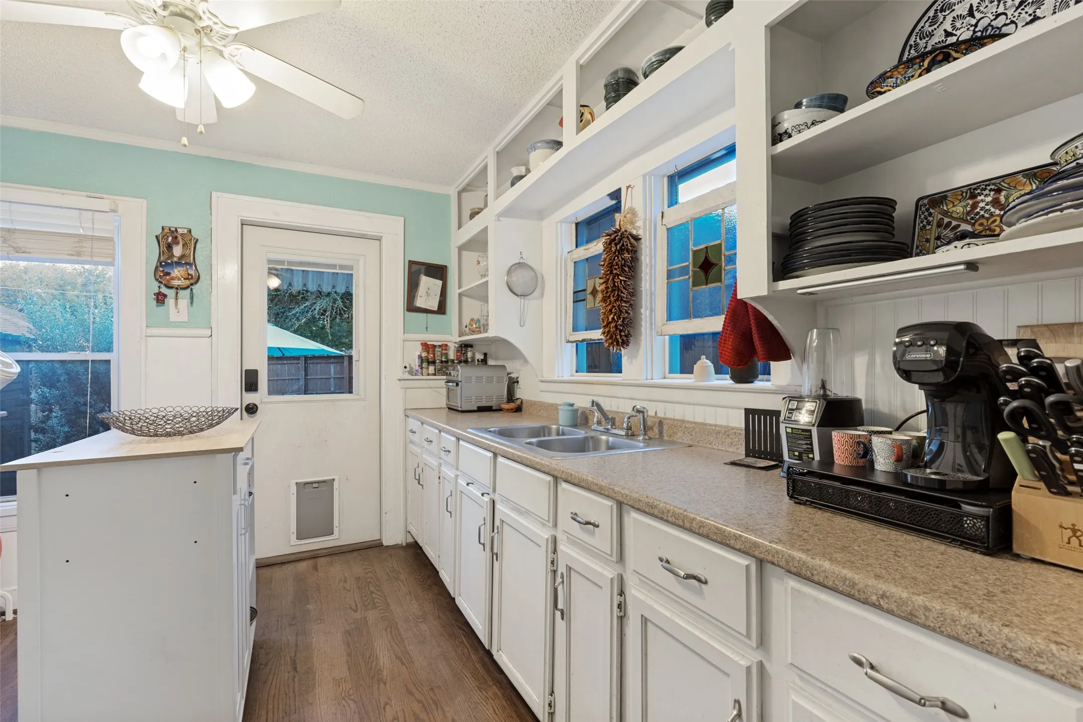 The efficient Kitchen packs in workspace and storage while retaining the home's authentic character.
