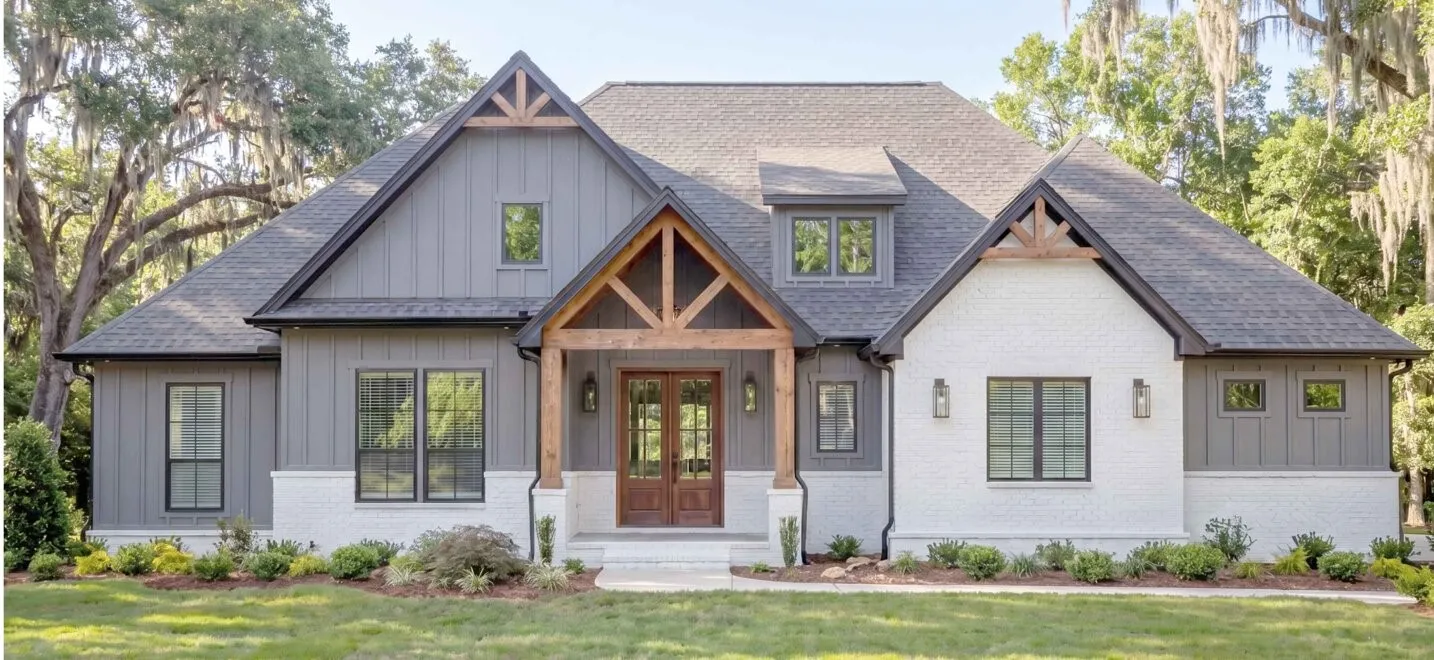 Contemporary farmhouse exterior featuring board and batten siding, brick accents, a prominent gable porch with wood beam detailing, a dark shingle roof, and a double-door entry
