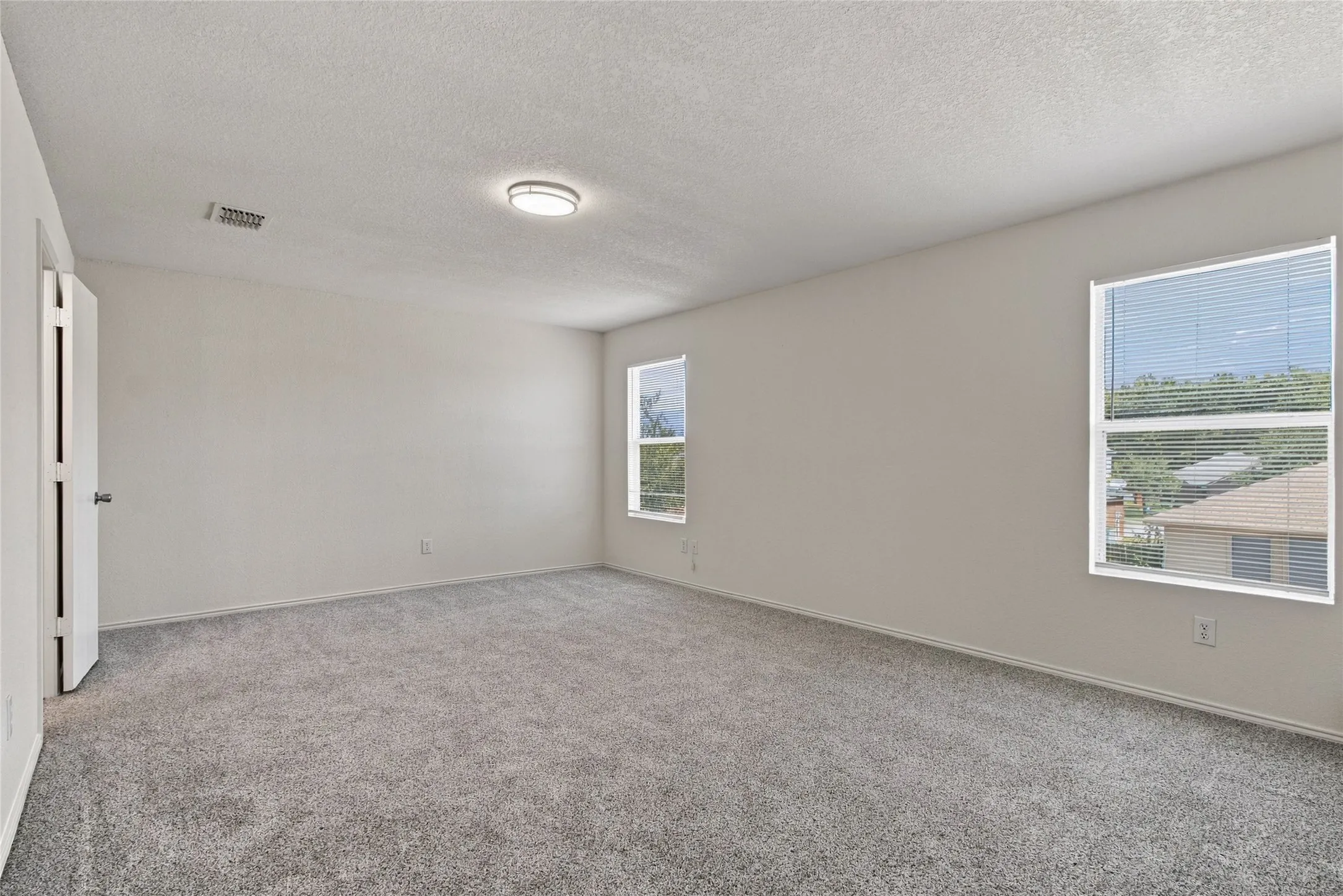 Large primary bedroom, with room for sitting area