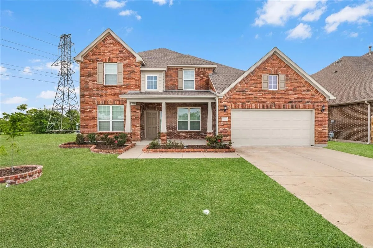Brick exterior with architectural shingles