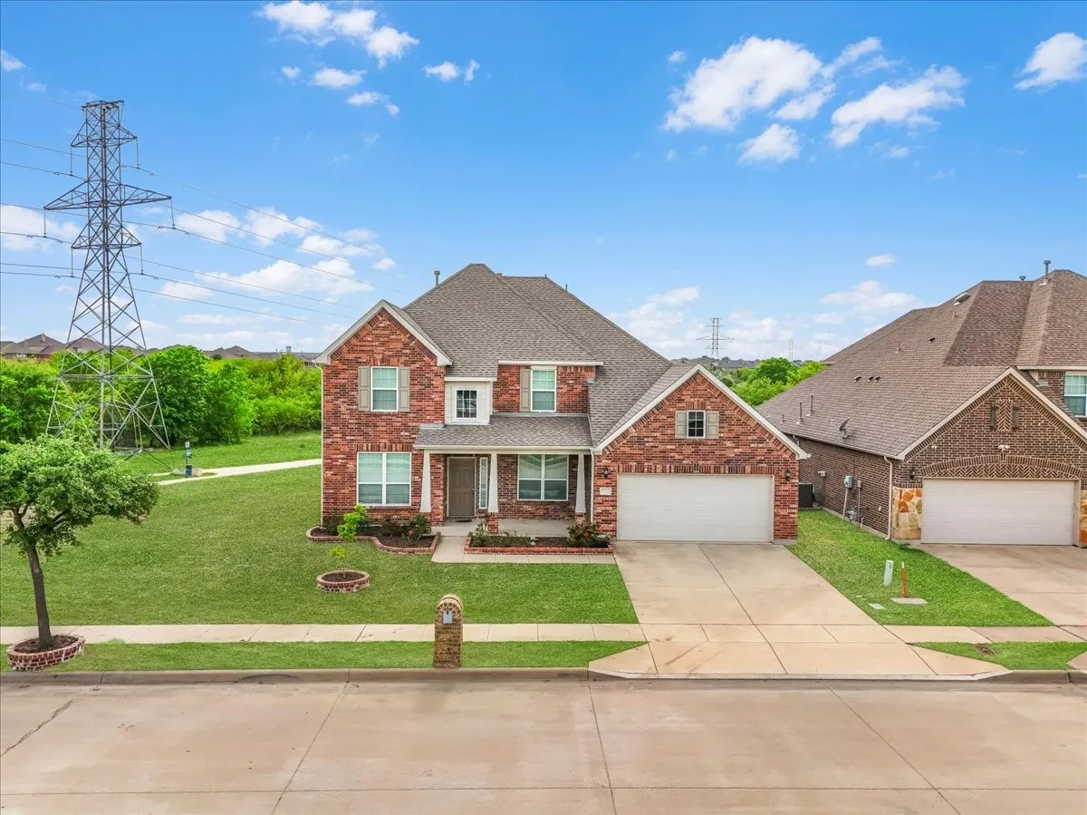 Red brick exterior with stone accents