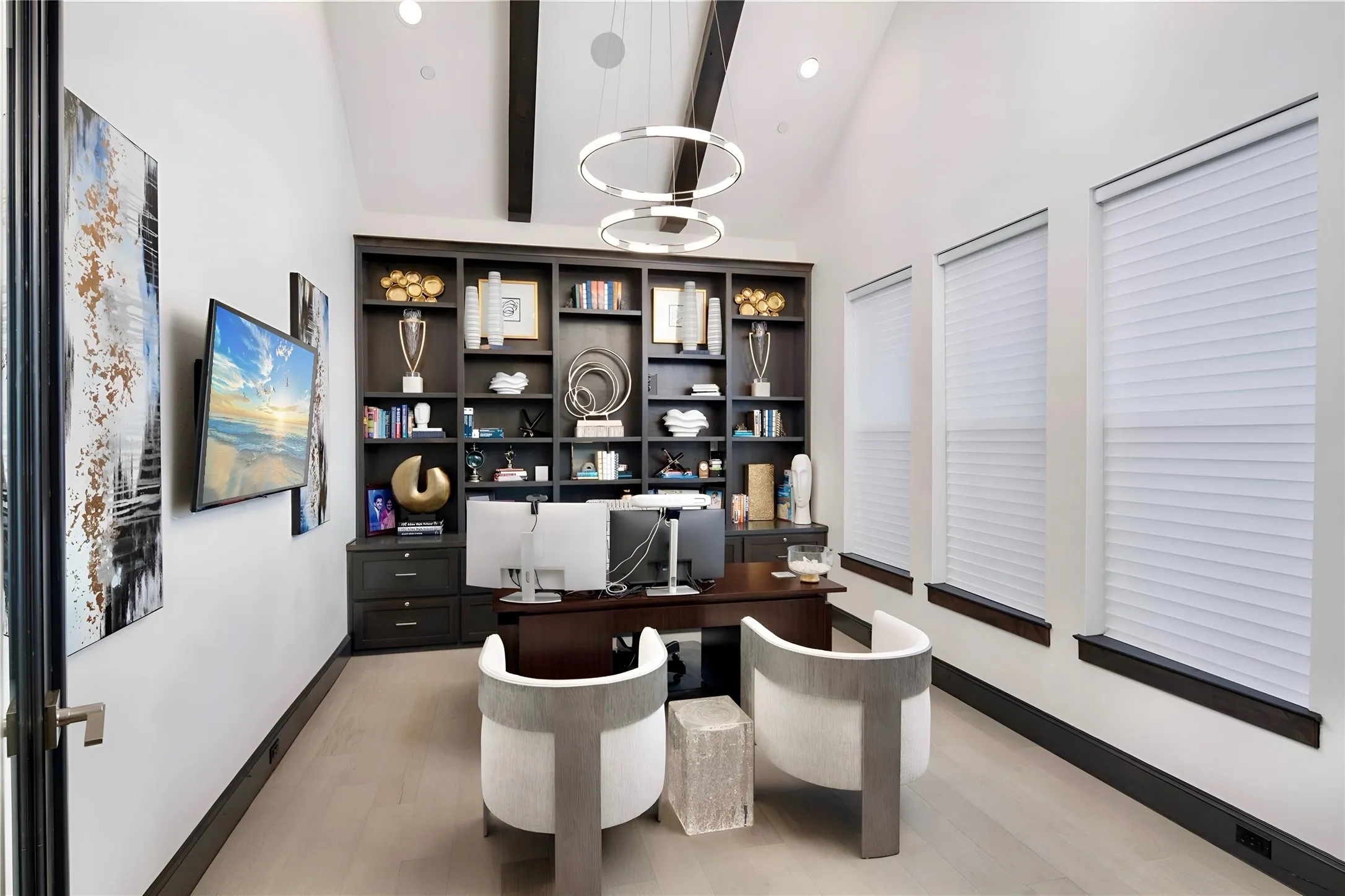 Private Office with Beams and a Wall of Built-in Shelves
