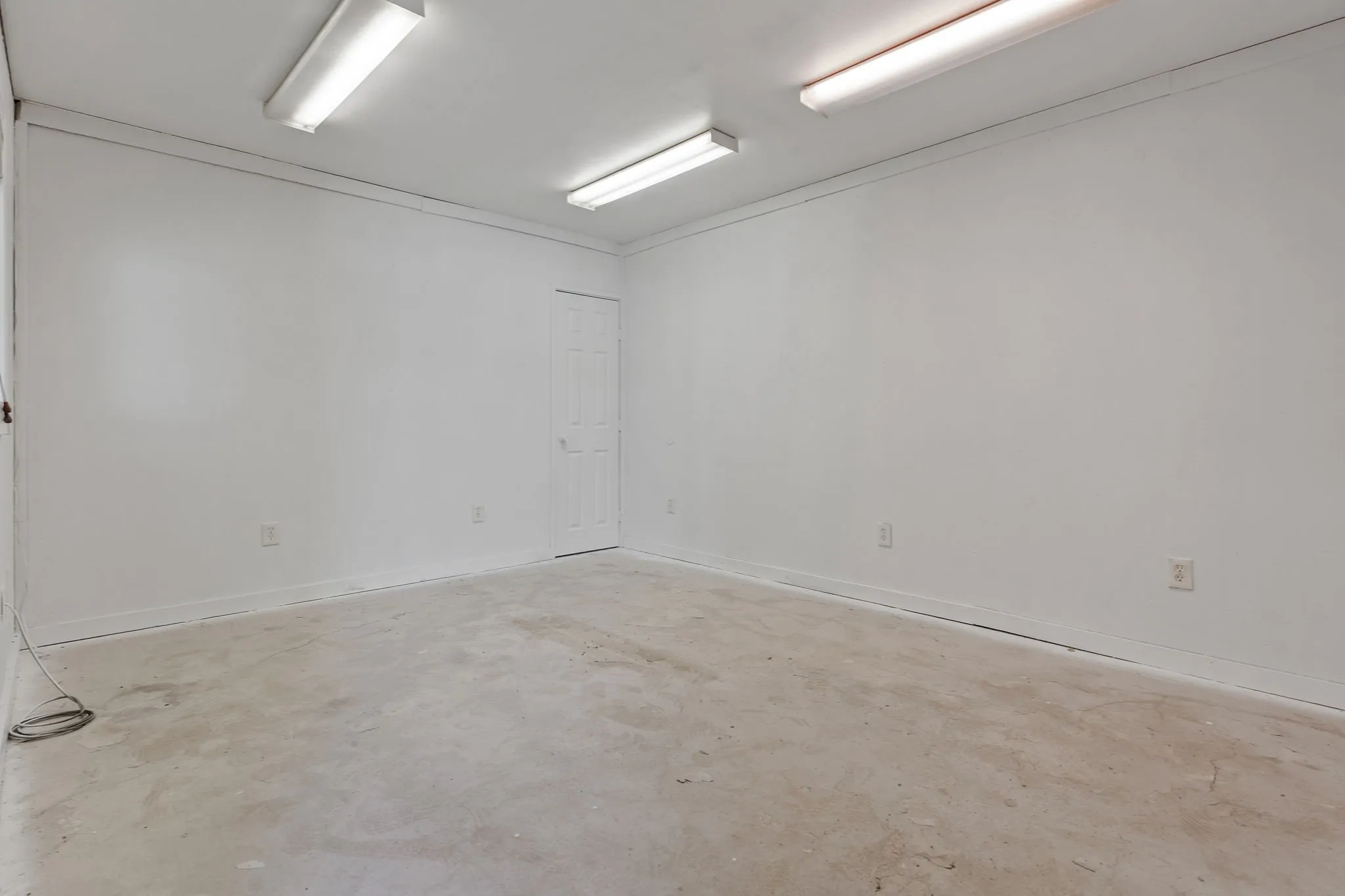 Approx. 14 x 12 office or storage area offering additional flexible space for business operations.