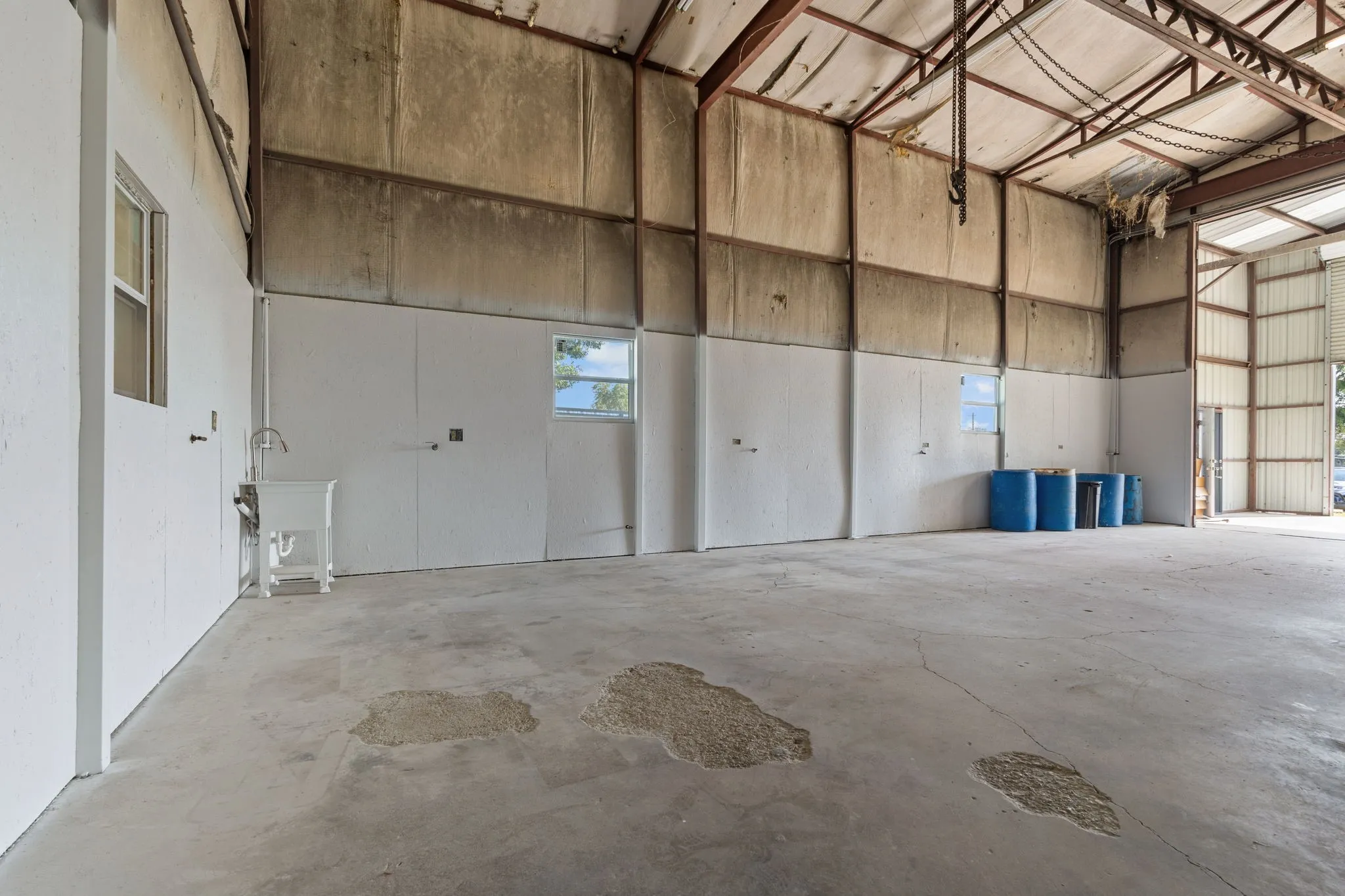 Expansive interior shop space provides excellent clearance and room for equipment, fabrication and storage.