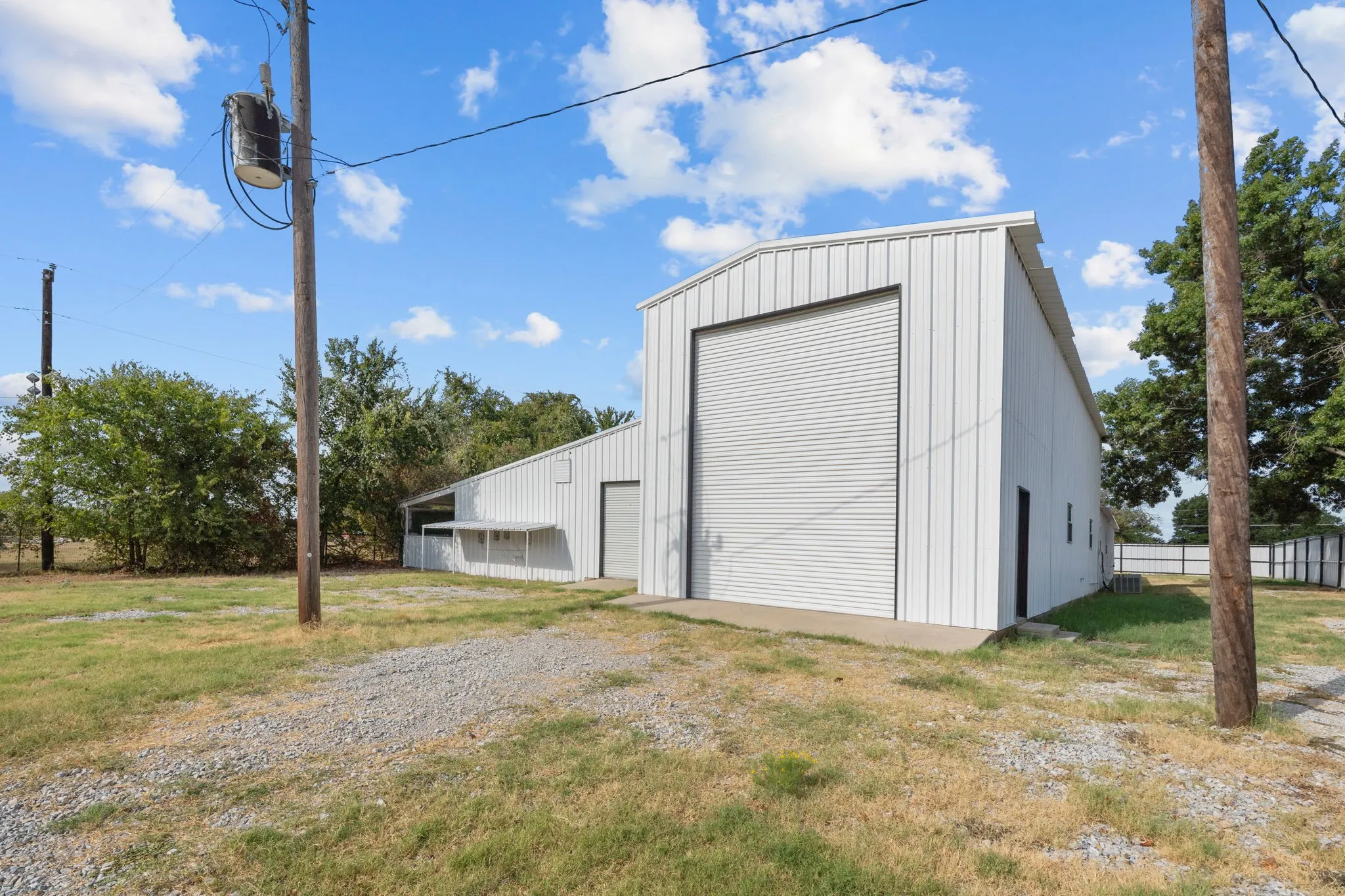 16 Foot overhead door access supports equipment, material handling and contractor use.