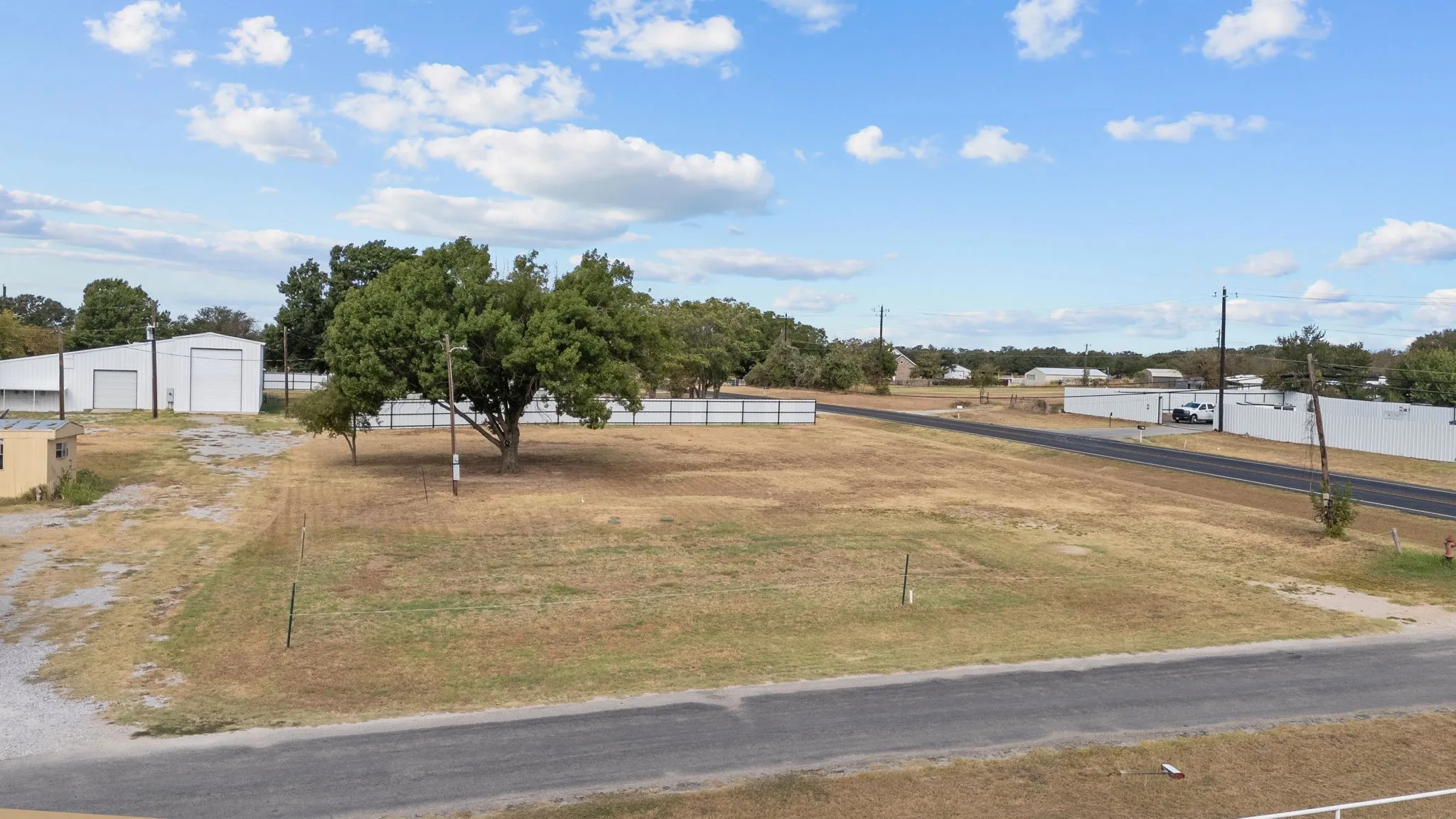 Open commercial yard area with frontage visibility and room for parking, circulation or future development.