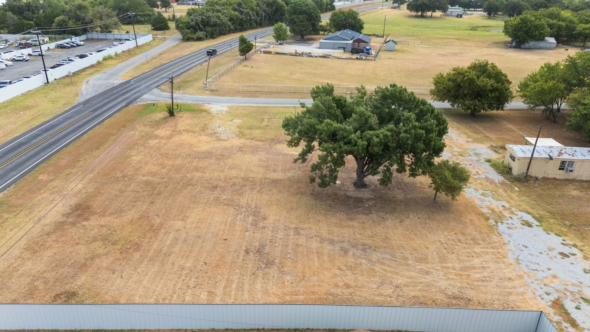 Corner site with substantial open land and access from E Reno Rd and Arvel Cir.