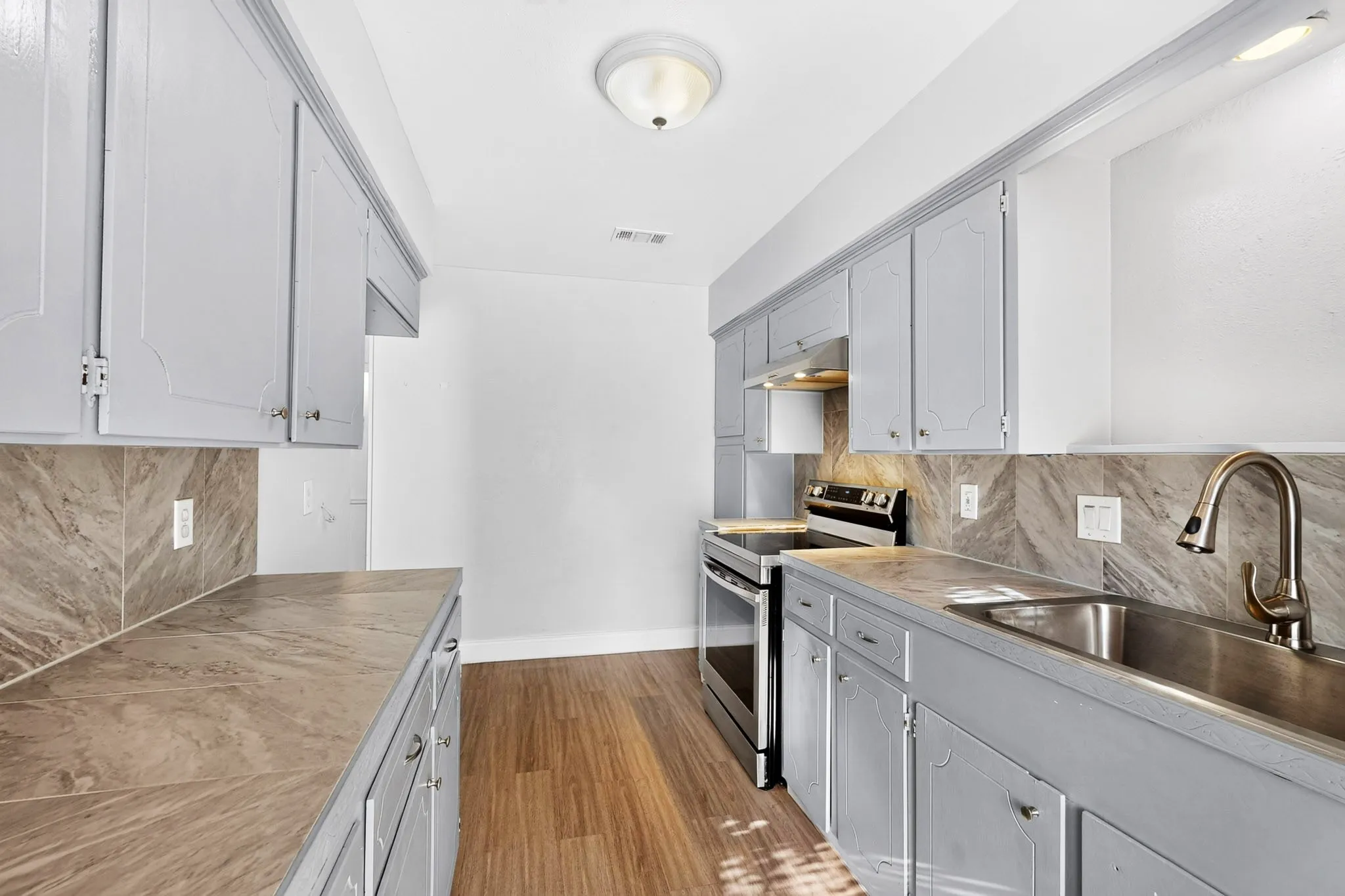 1427 view from kitchen window showing countertops