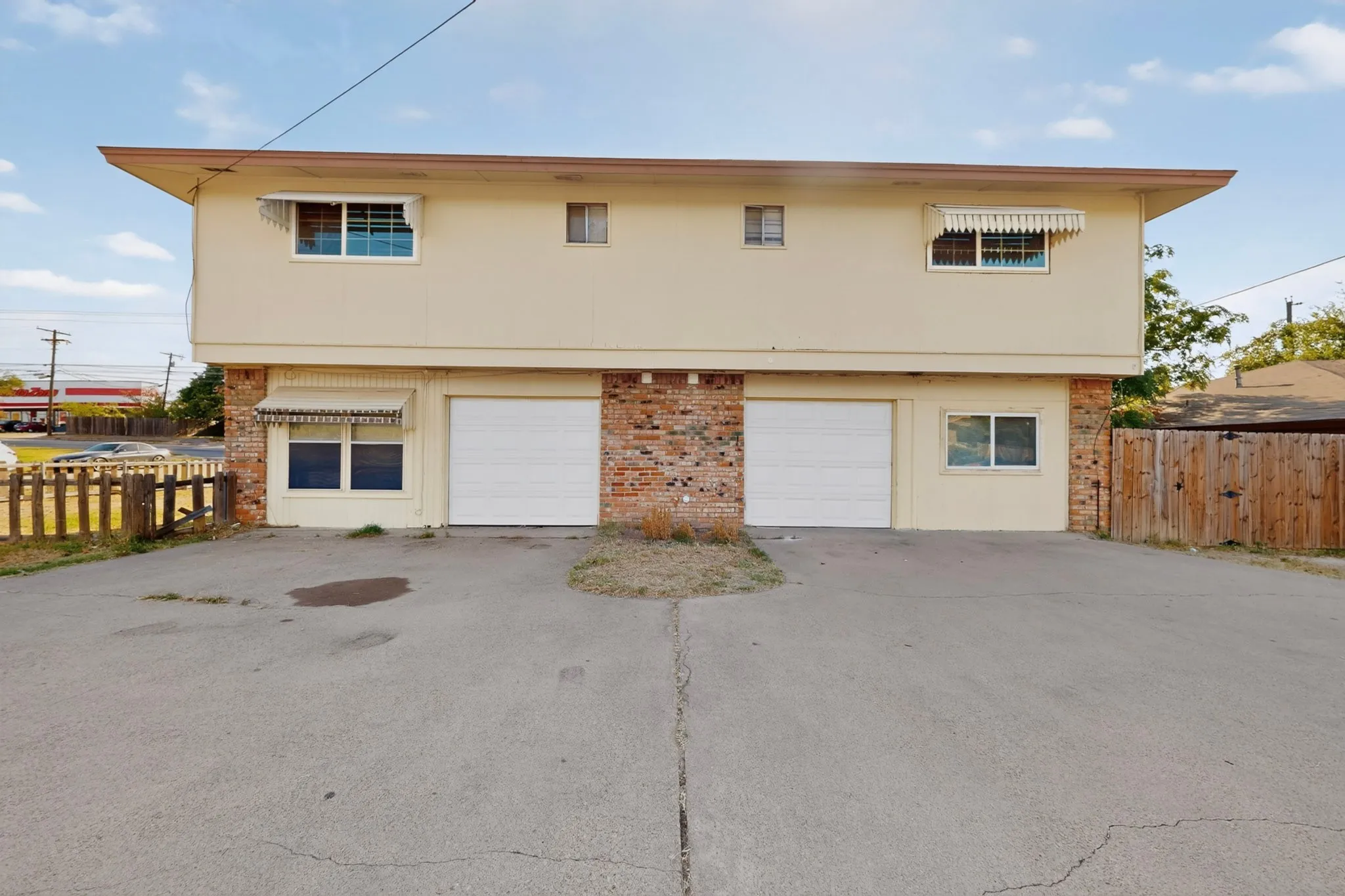 Parking and garage for Unit 1425 on left and Unit 1427 on right