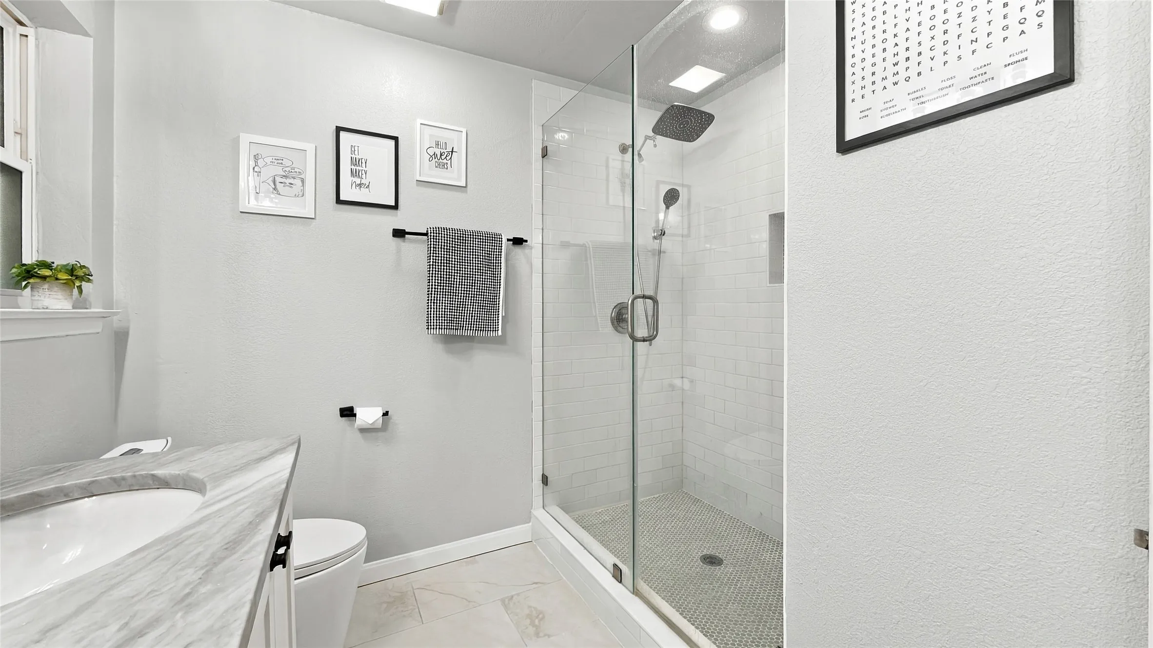 Enjoy the frameless shower.