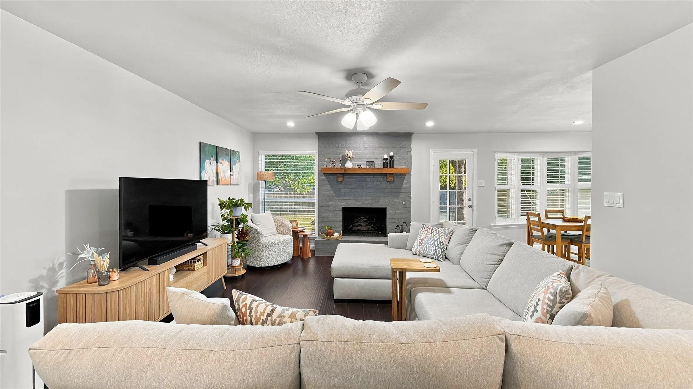 The living is nice and spacious with a beautiful fireplace.