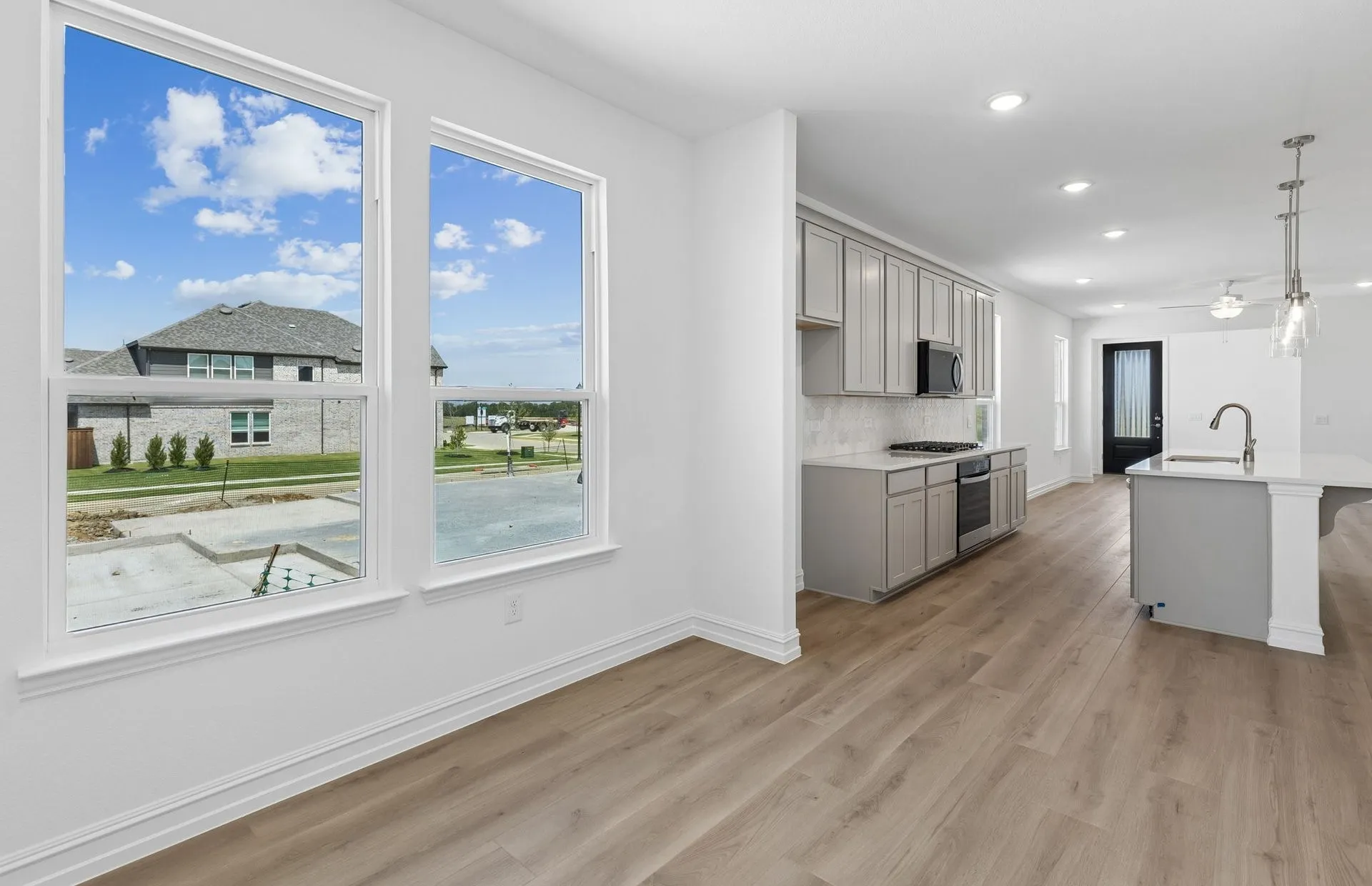 *Floorplan representation, not actual home - Spacious gathering room with large windows