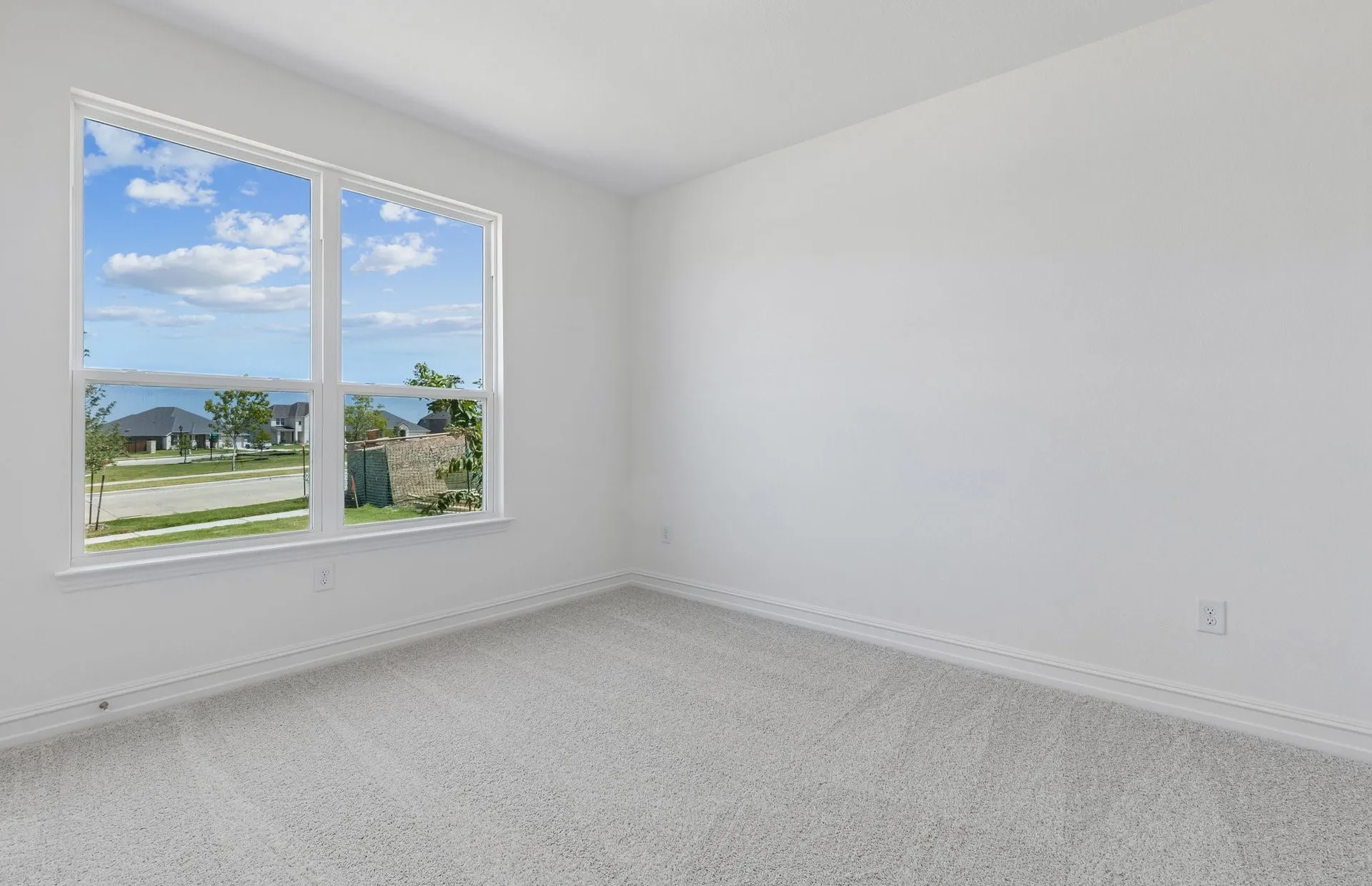 *Floorplan representation, not actual home - Spacious secondary bedroom with large windows