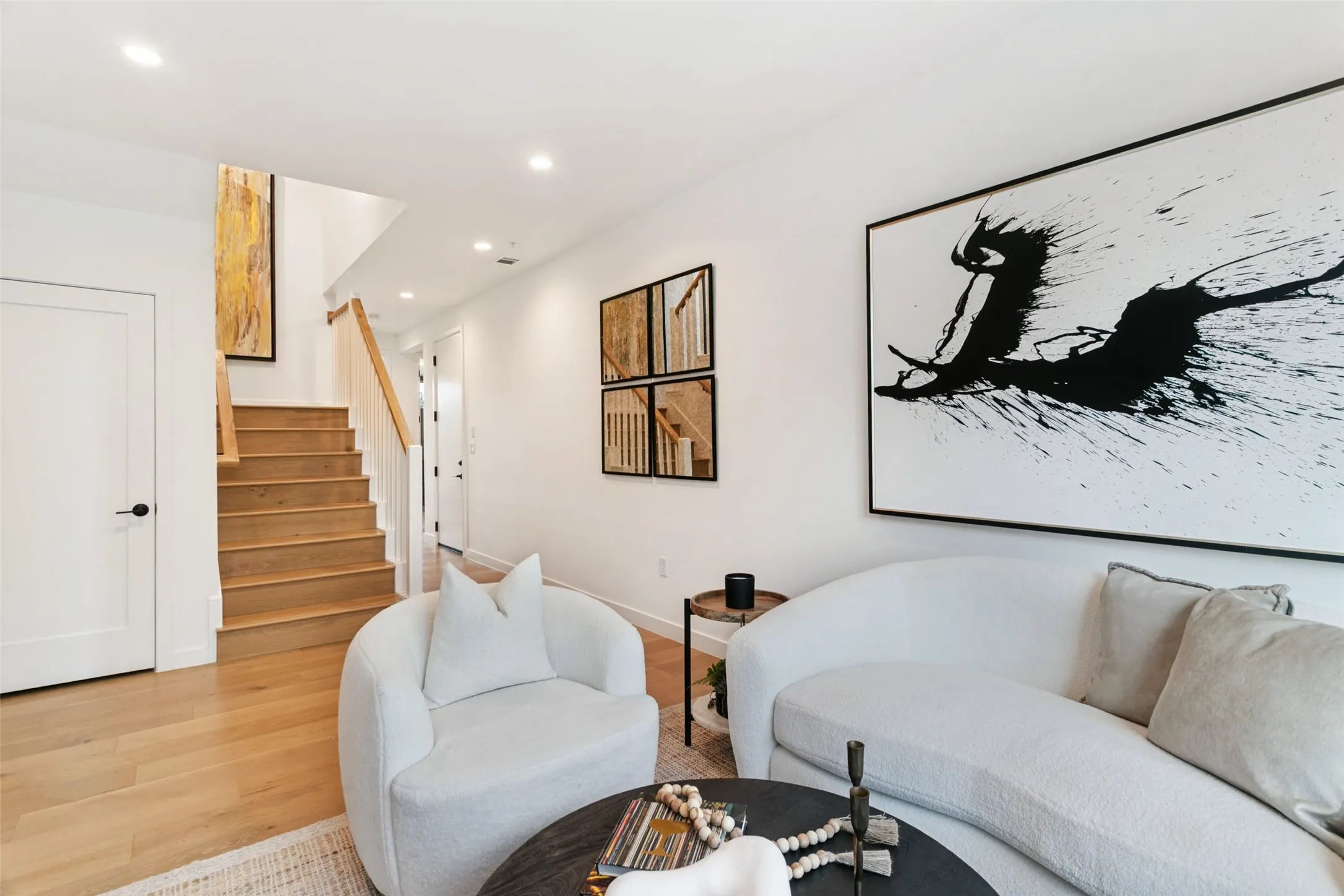 Great under-stairs storage for golf clubs, luggage... Two bedrooms, full bathroom, elevator, and laundry also located on first floor.