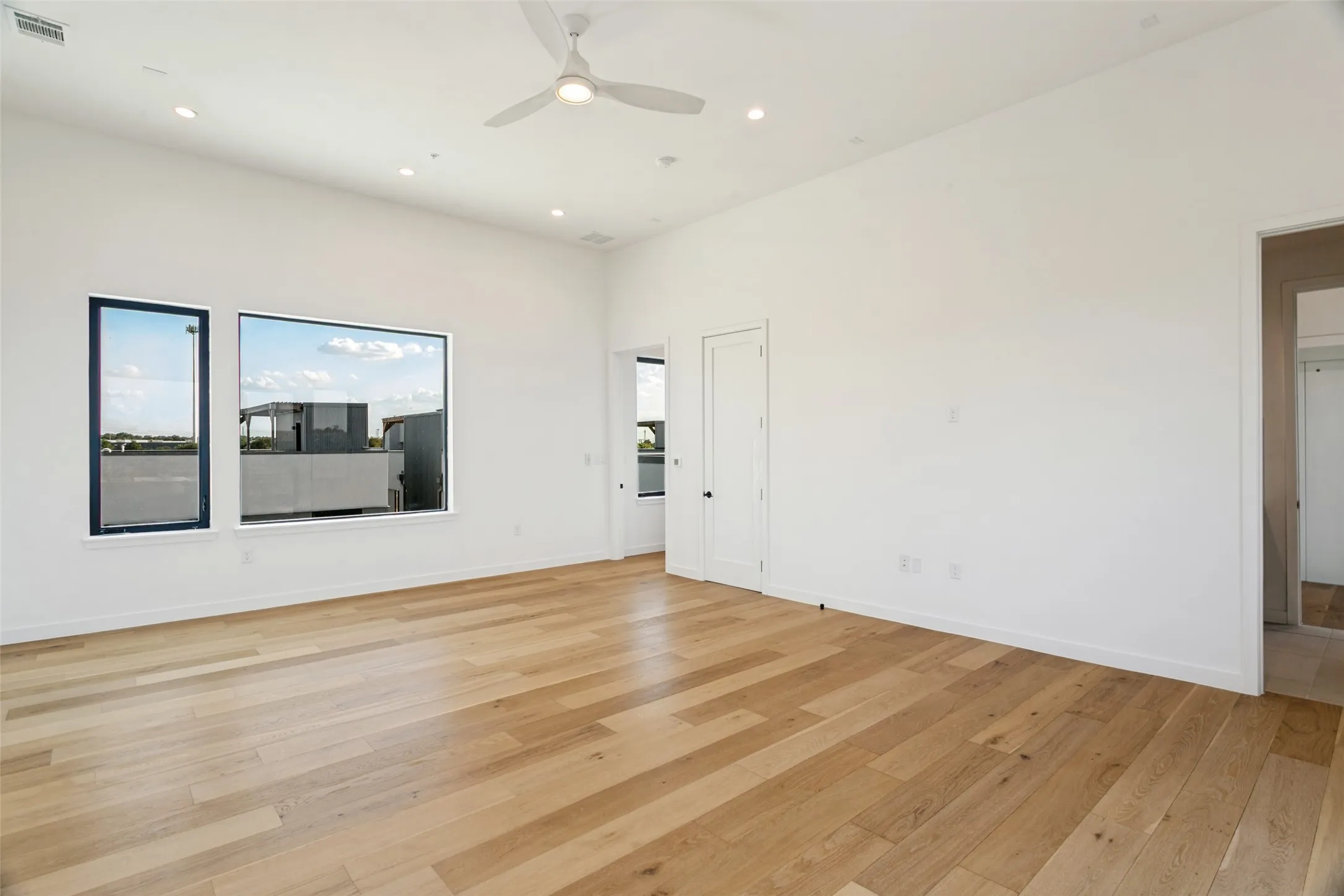 22x17 3rd floor room has walk-in closet and full en-suite bathroom. Designed to be 4th bedroom, studio set up, media room, workout room, game room...Whatever fits your need