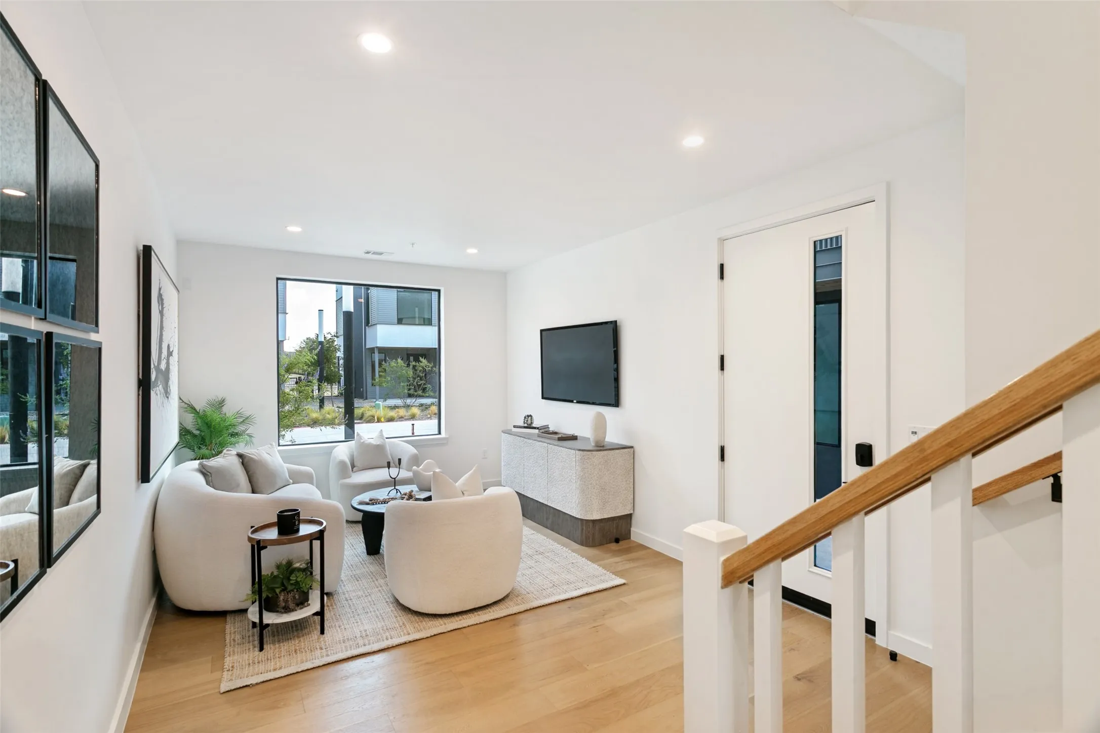 1st floor entry, secondary living room or office space.  Entry from garage and elevator are both just steps away.