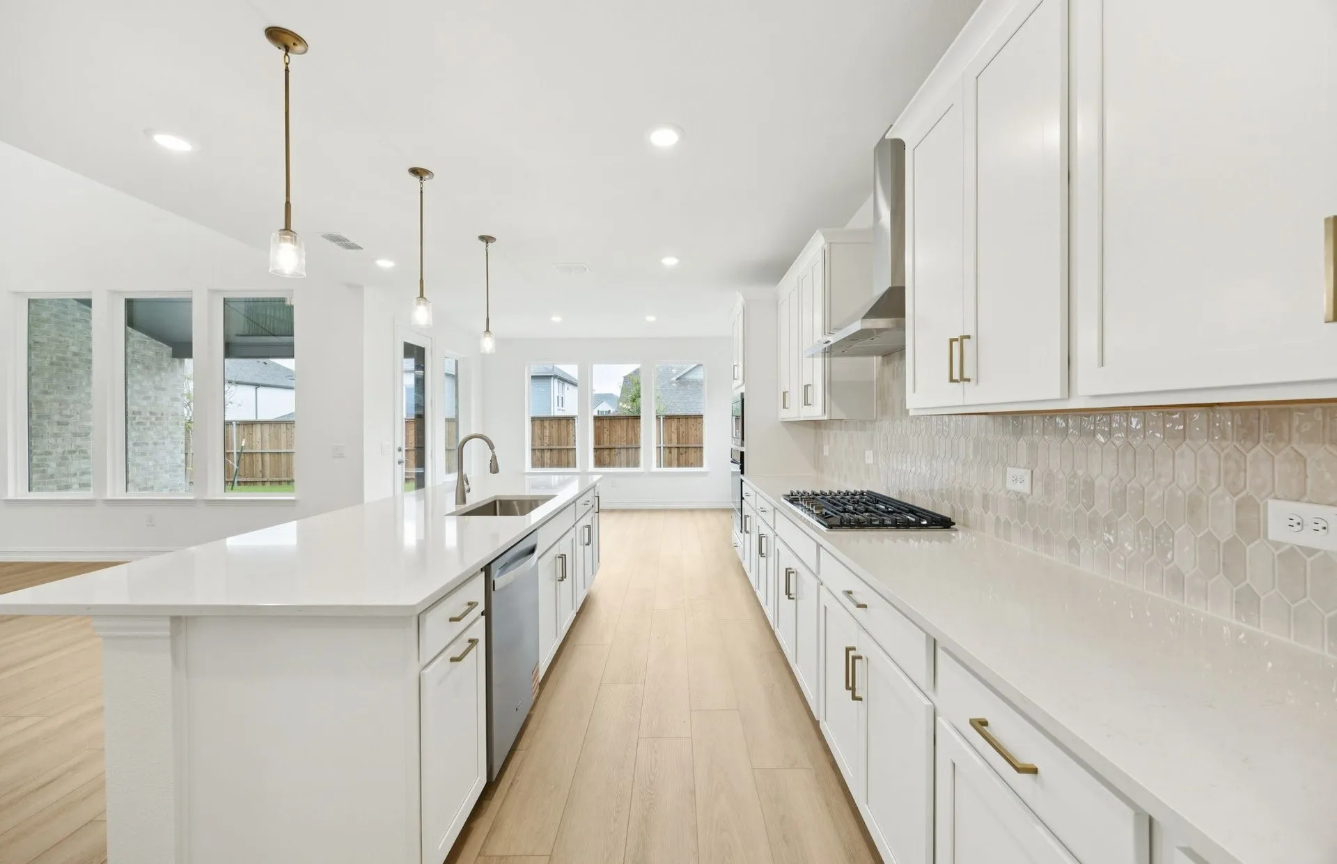 *Floorplan representation, not actual home - Large island overlooking gathering room and dining areas