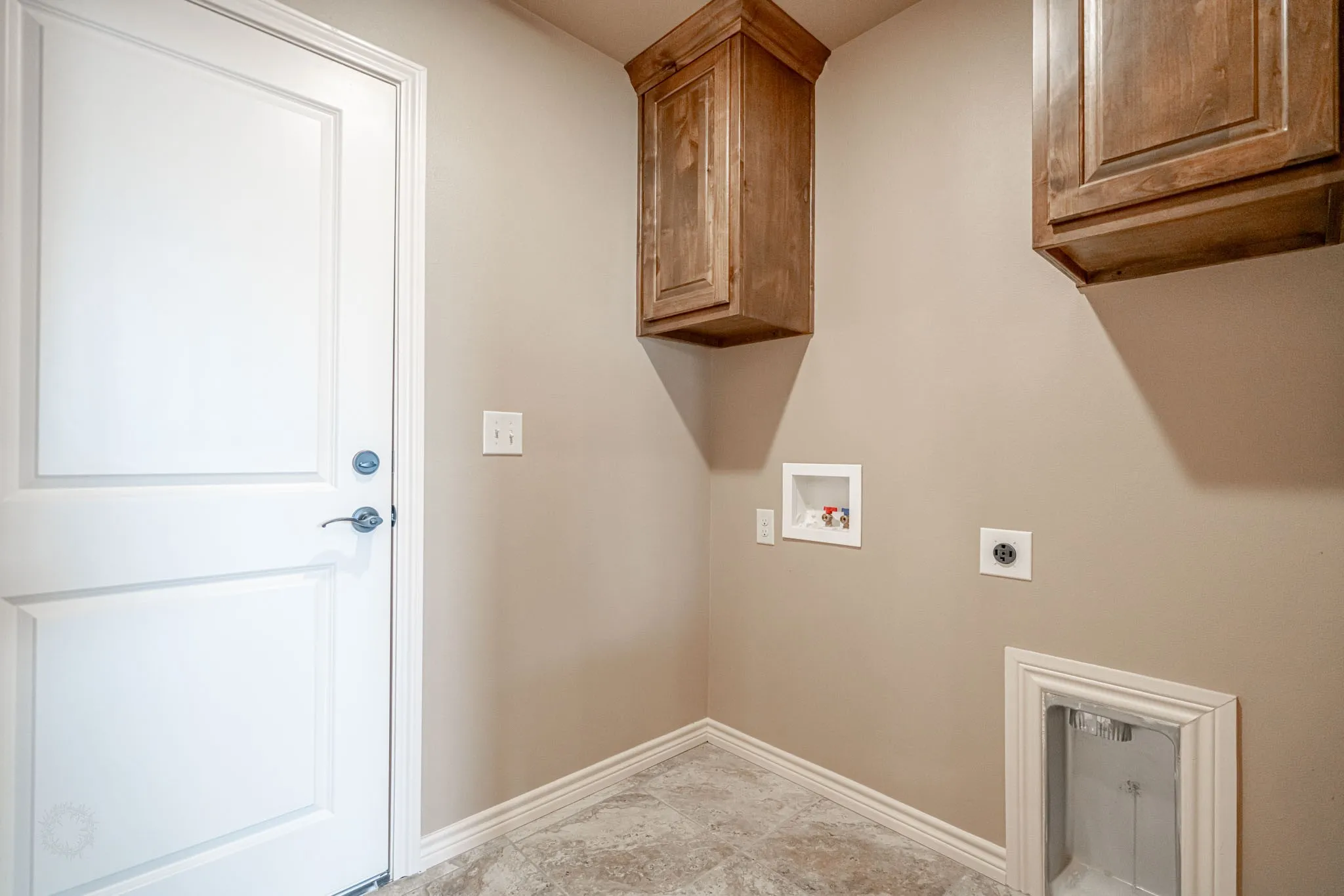 Full sized laundry room off garage