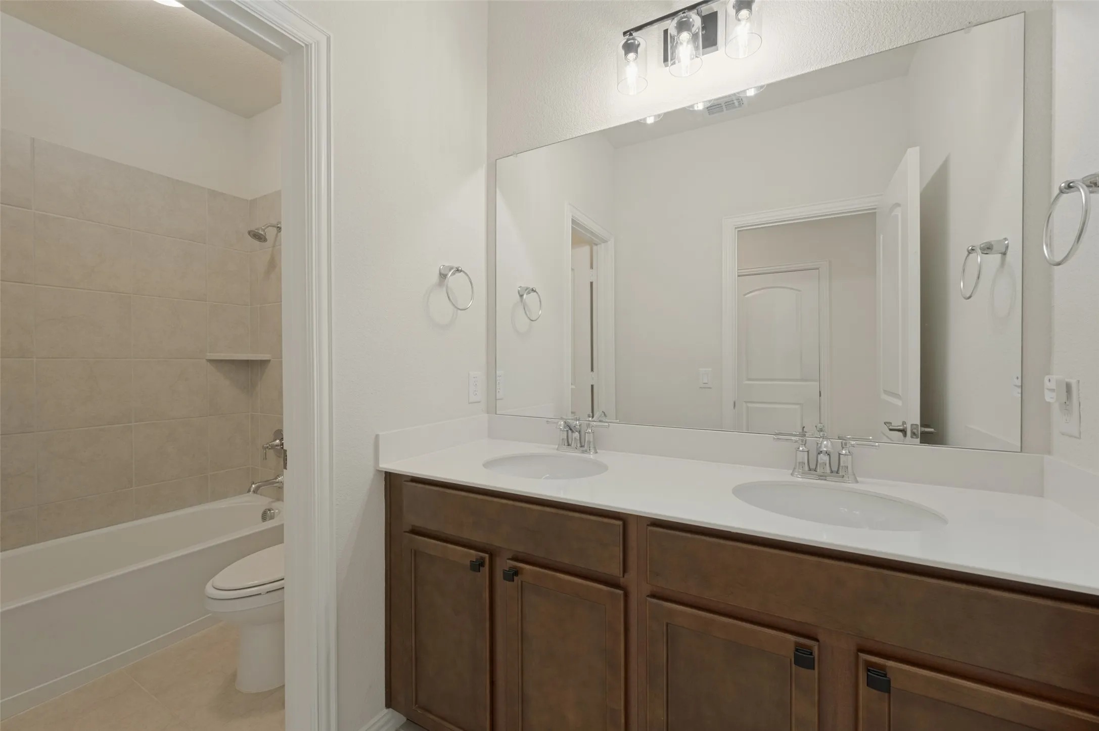 Double vanity with white countertop