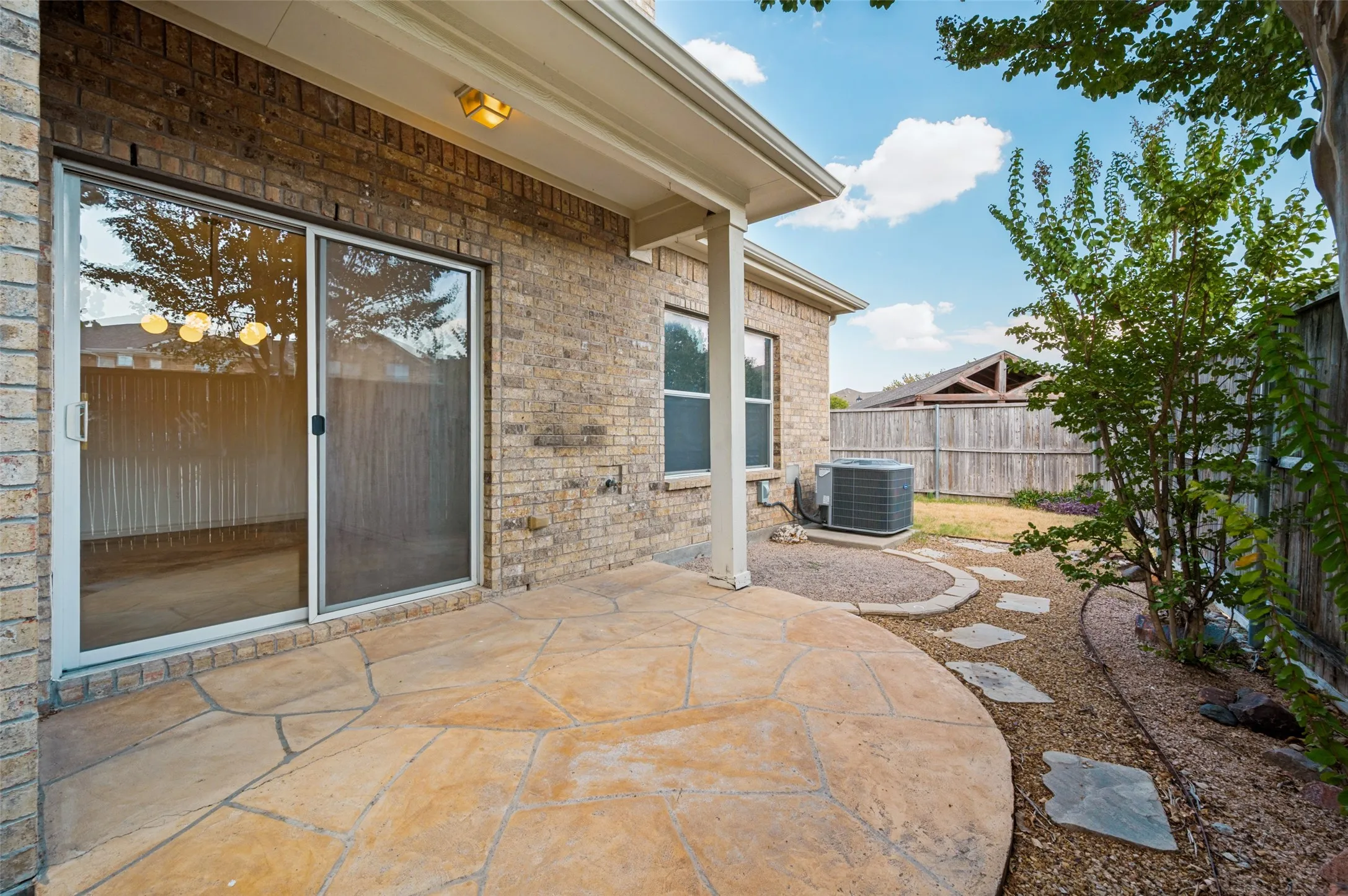 Large backyard off of patio