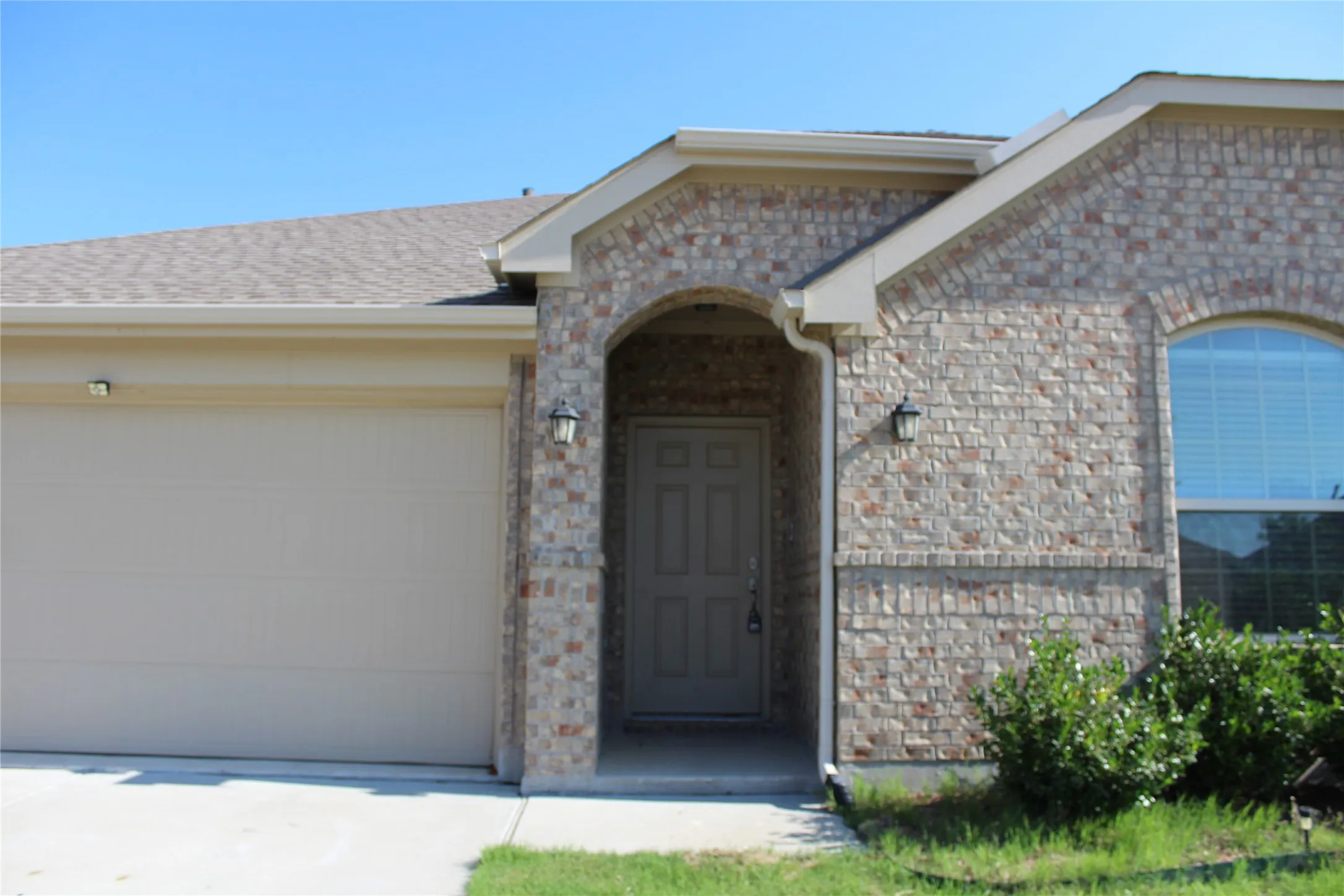 Brick facade with arched entryway