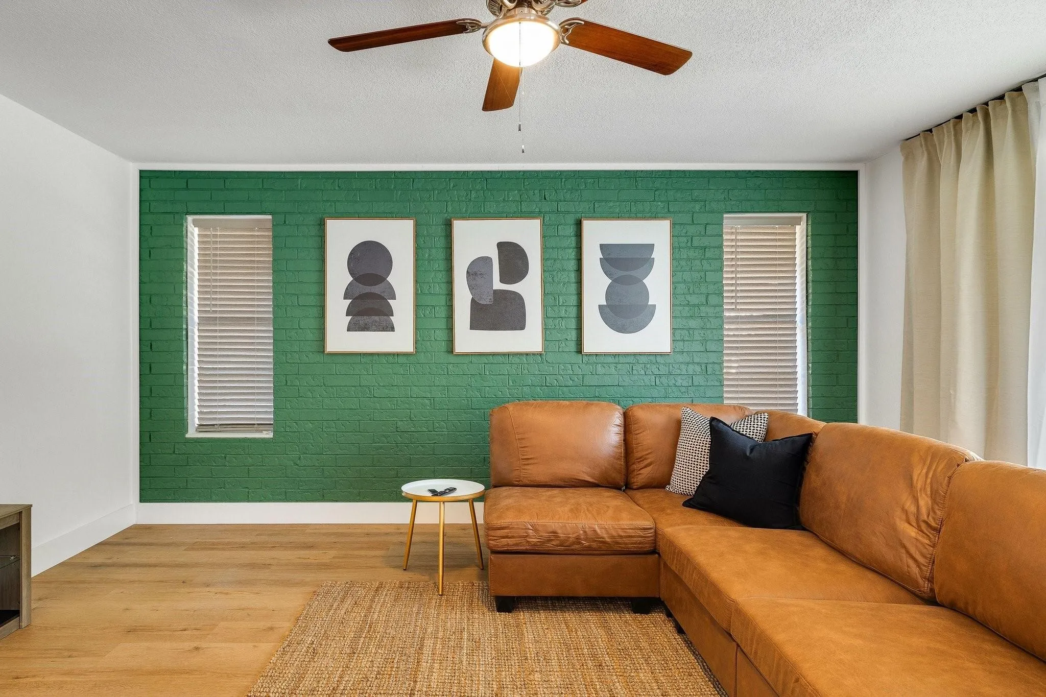 Wood-finish flooring with a textured area rug