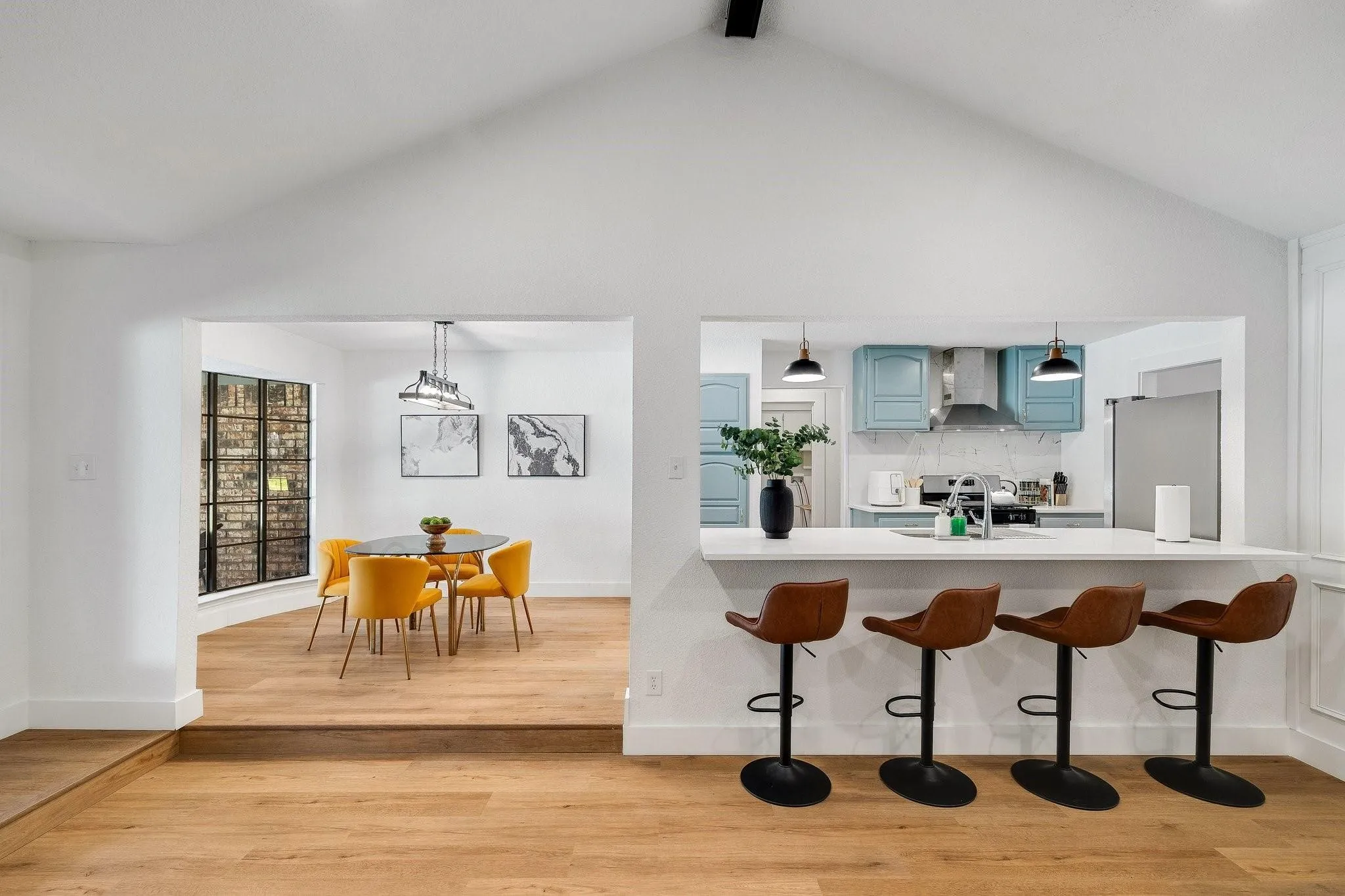 Vaulted ceiling with a black track light fixture