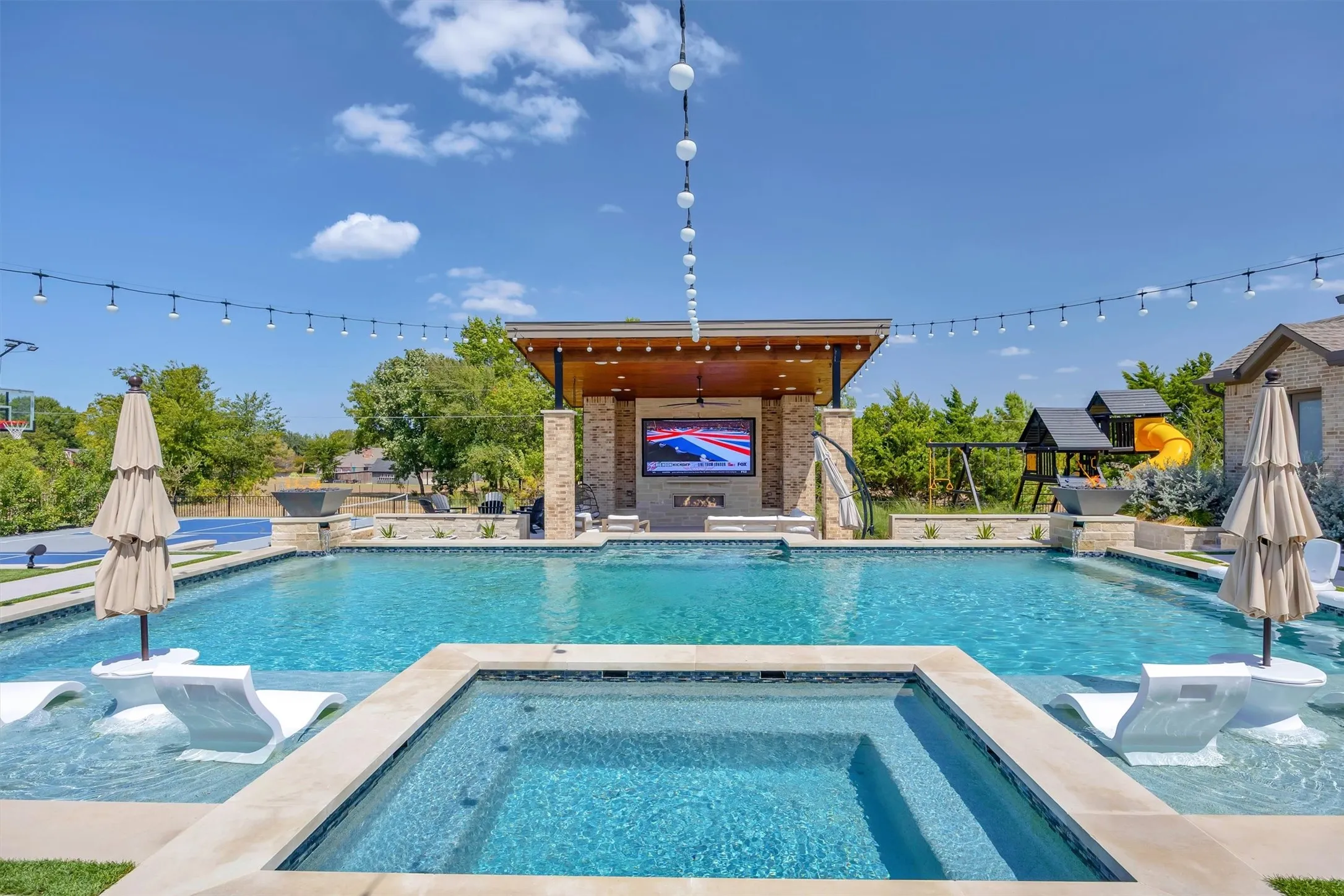 Expansive saltwater pool with heater and chiller for multi-season enjoyment!