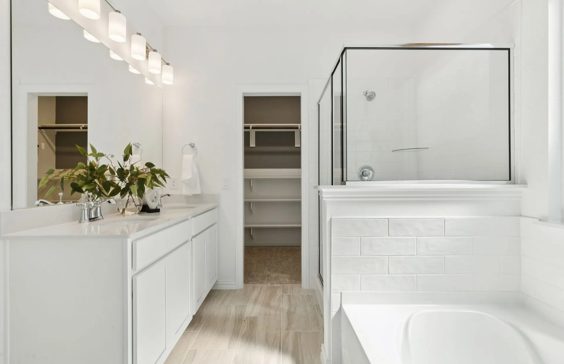 *Model Representation - Owner's private bath with double vanity