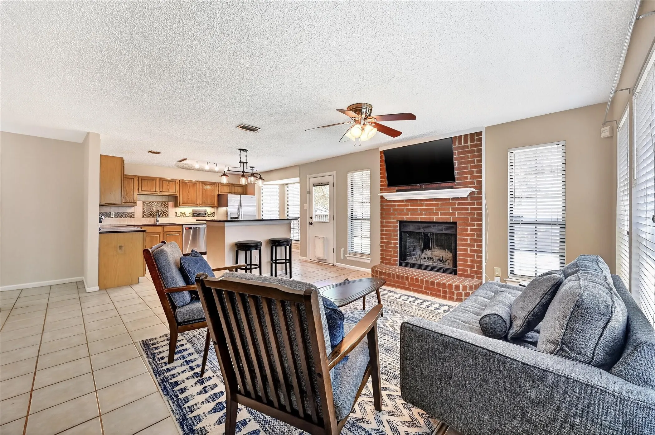 Living Room 2 with brick fireplace