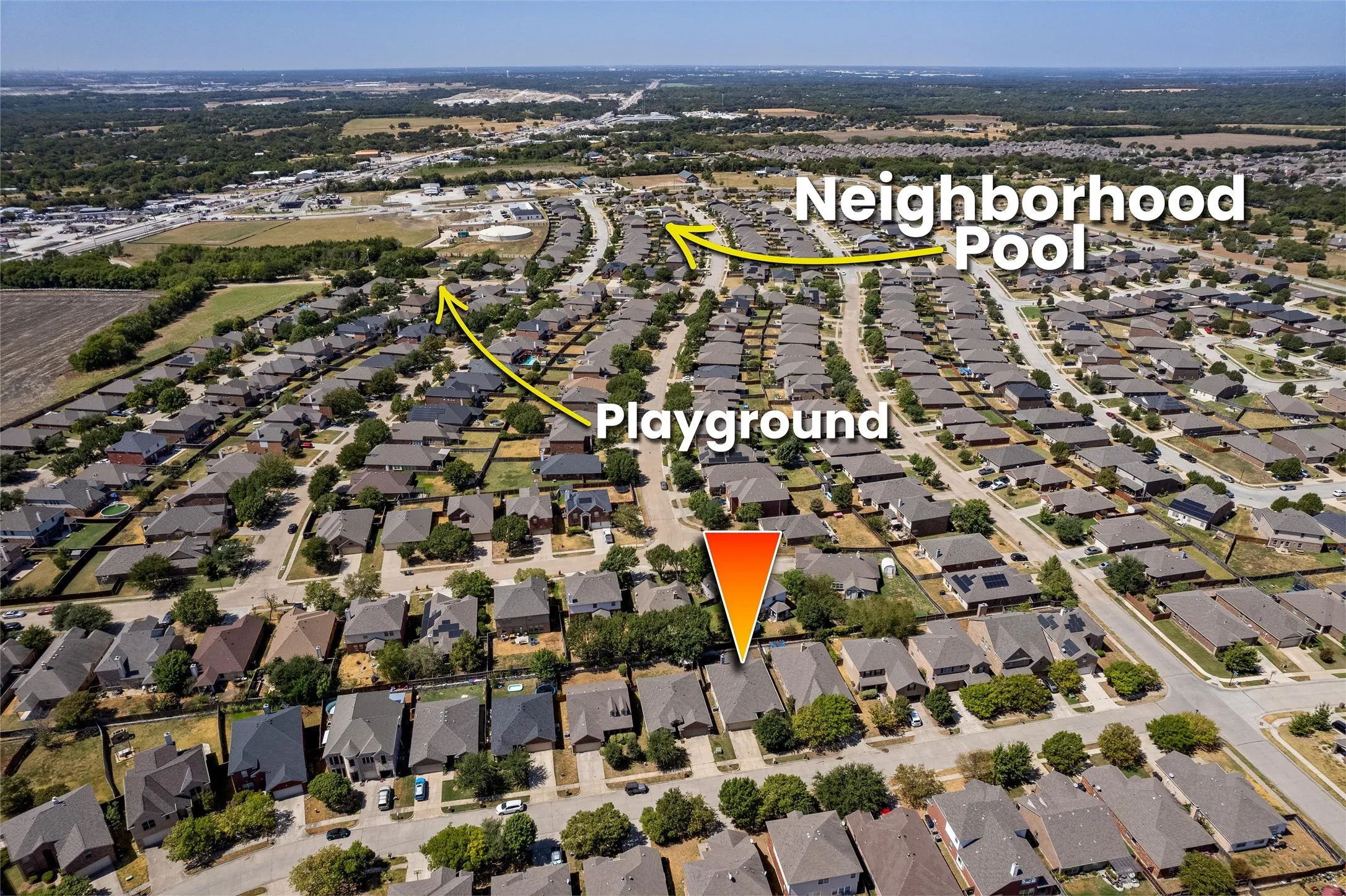 Aerial view to playground and pool.