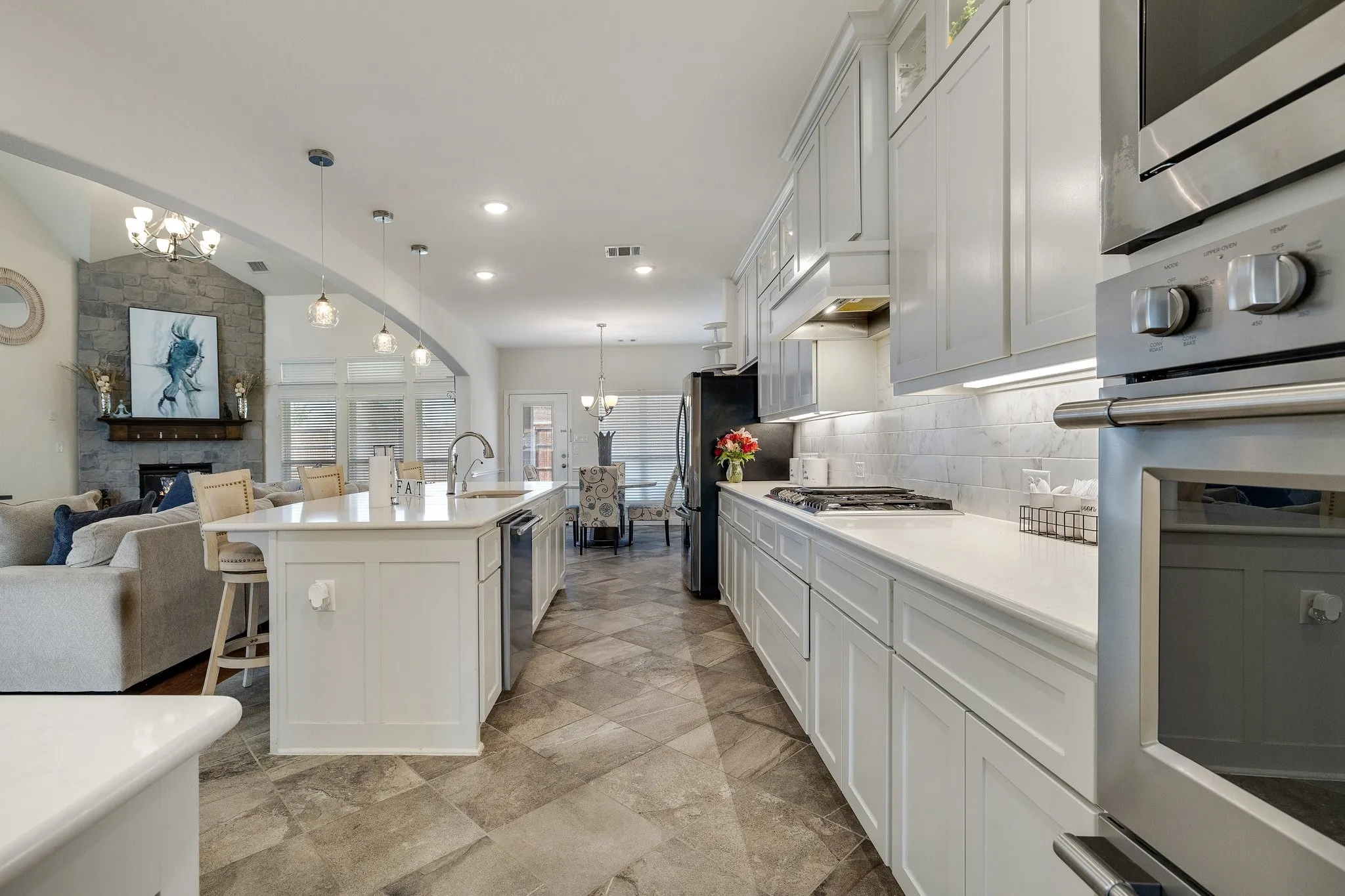 Kitchen: A bright, spacious kitchen designed for both everyday living and entertaining.