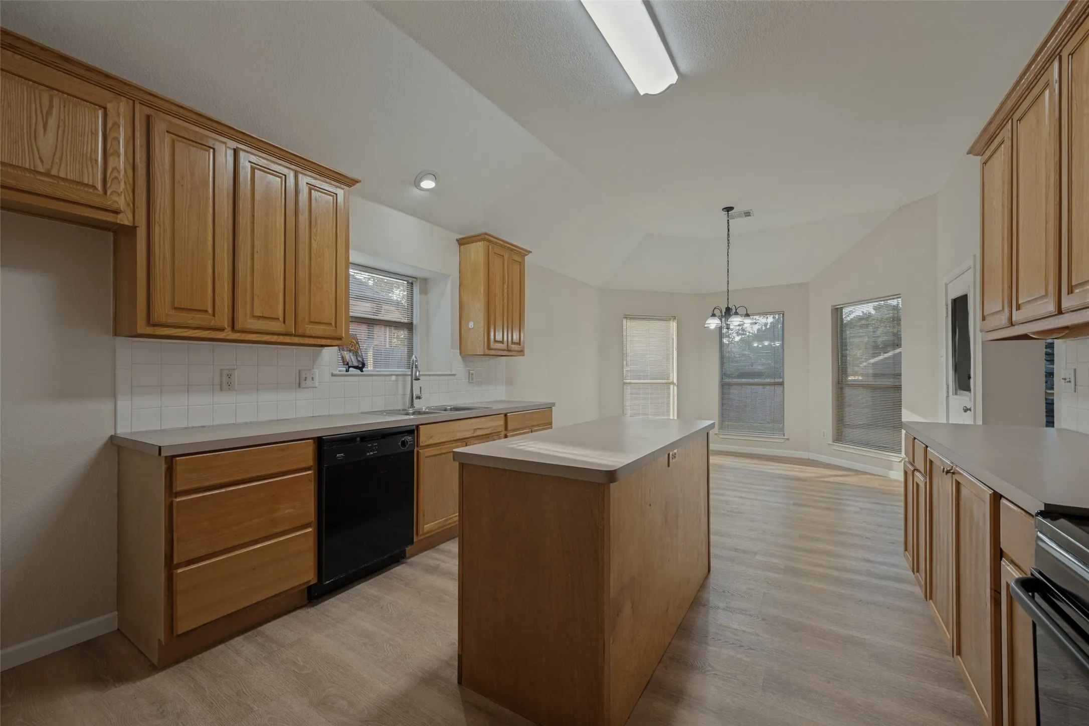 Large kitchen with Island and breakfast area.