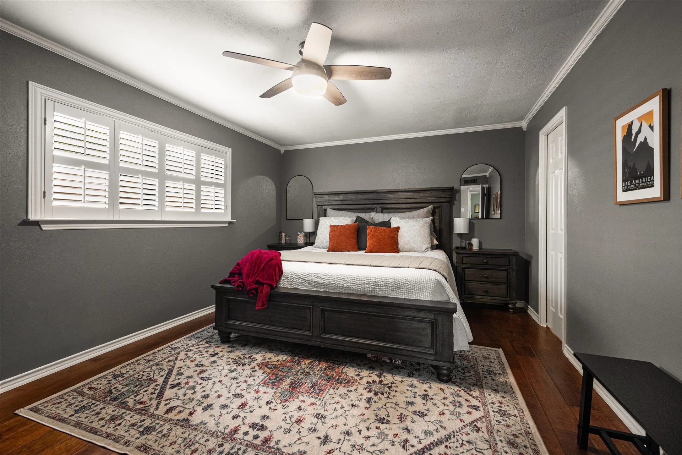 Recessed lighting, wood-finish flooring, white crown molding, ceiling fan with integrated lighting, and white window shutters