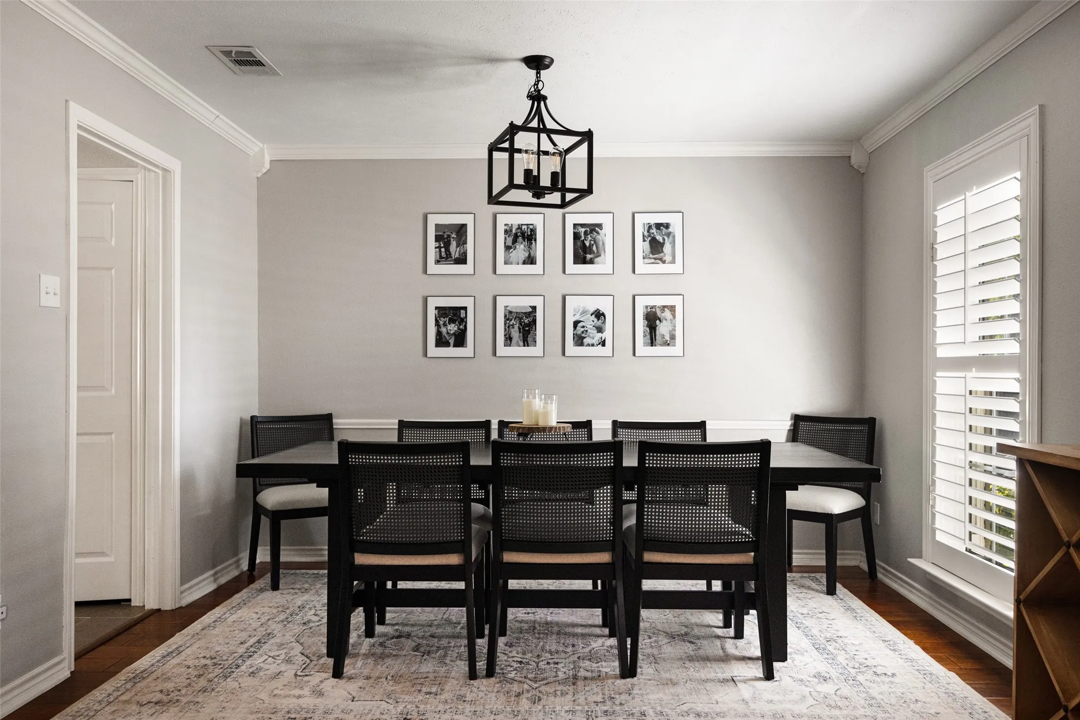 Hardwood flooring, crown molding, chair rail molding, and plantation shutters