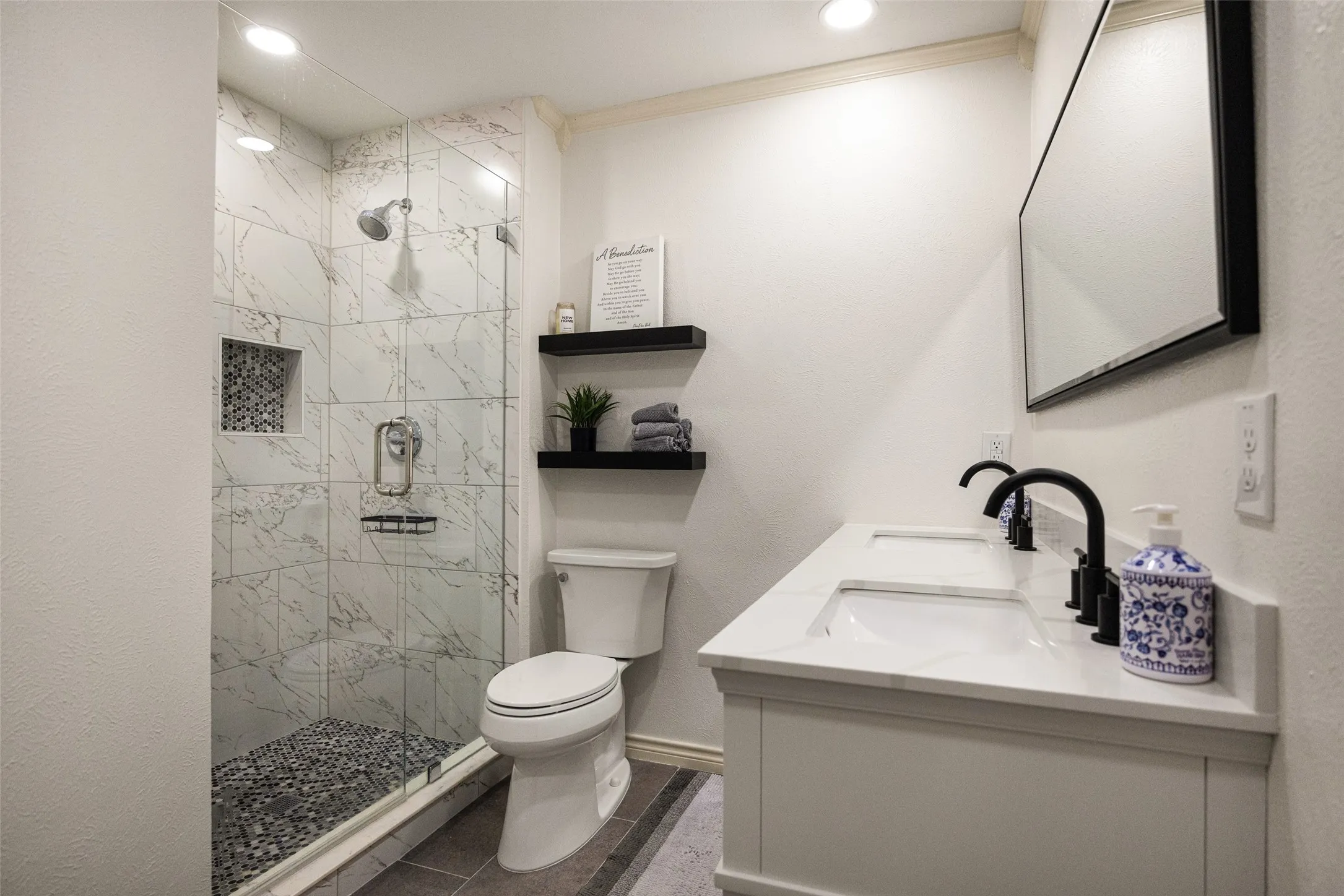 Dual vanity with undermount sinks and matte black fixtures