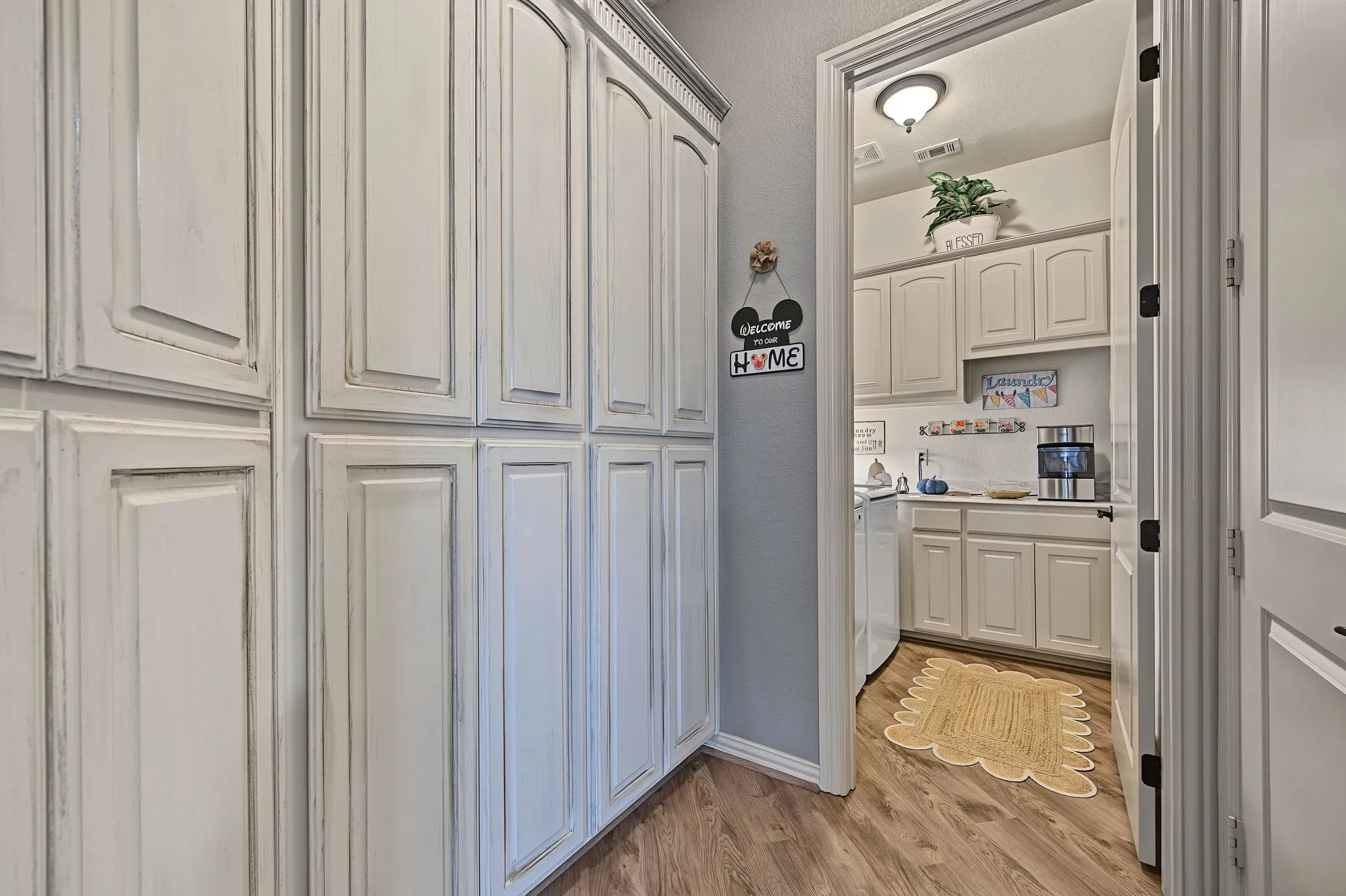 So much storage for your appliances or additional pantry items. Situated in the hallway.