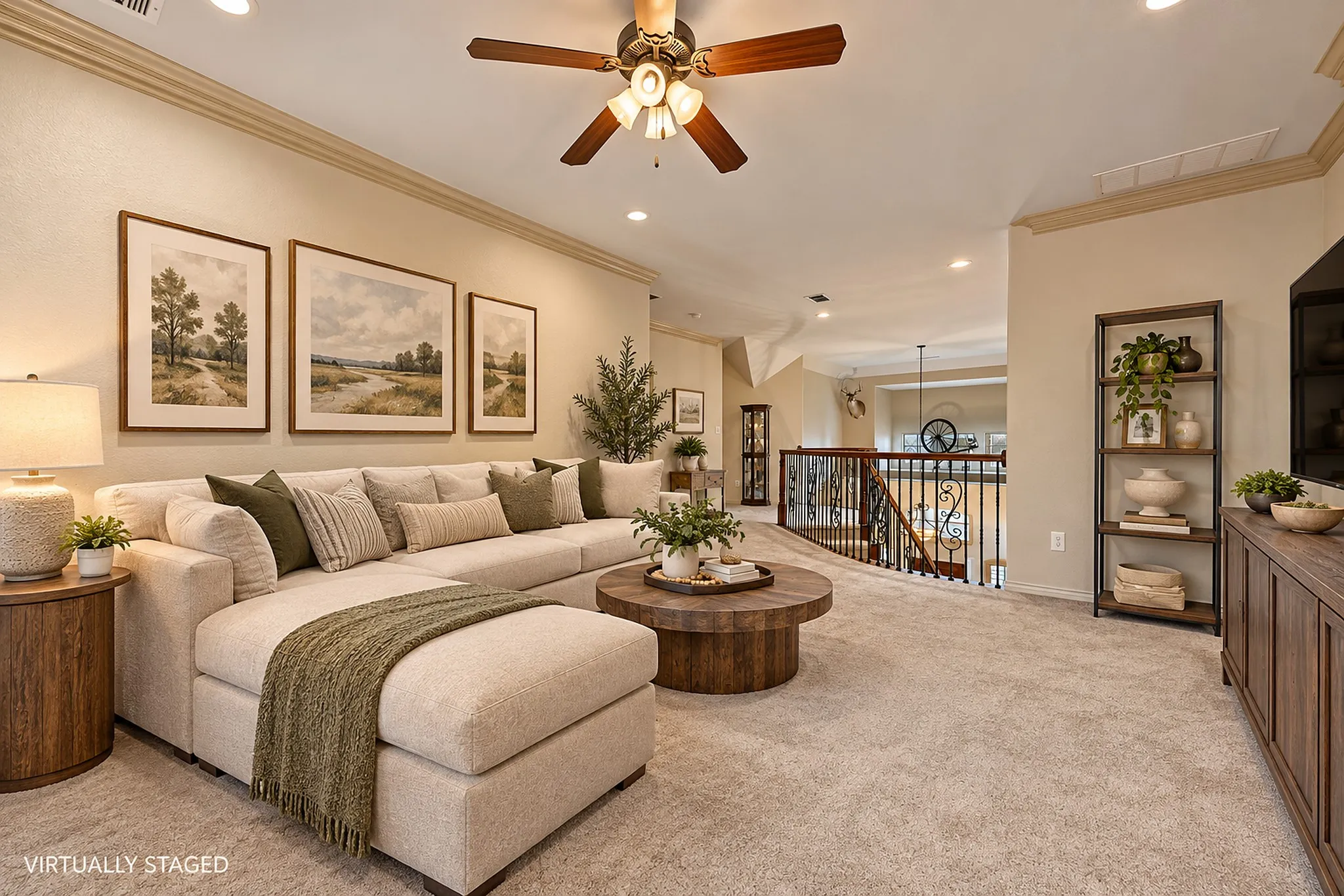 Virtually staged with modern transitional  furniture. Upstairs living area featuring a ceiling fan, recessed lighting, and crown molding