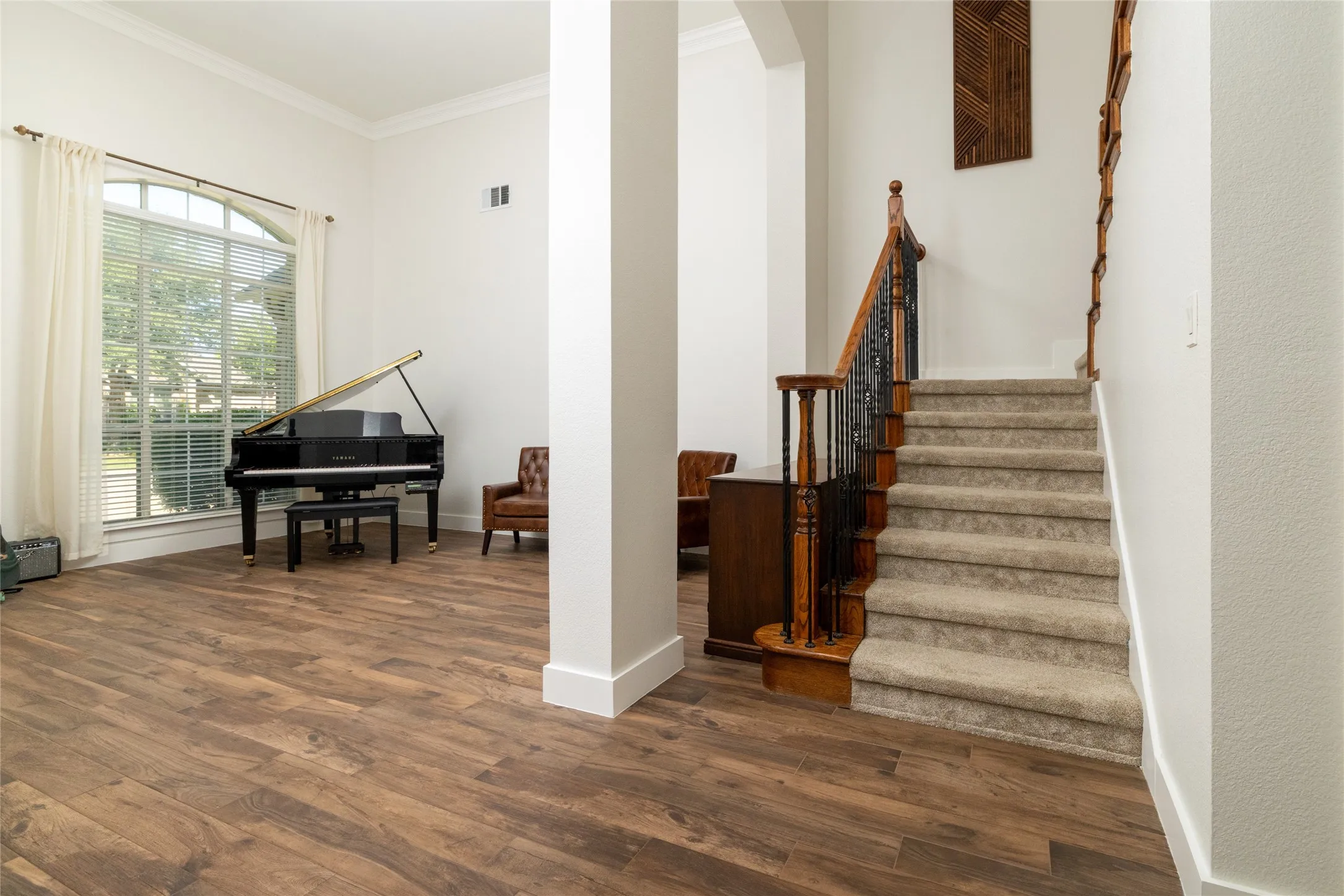 View of secondary living room and stairs