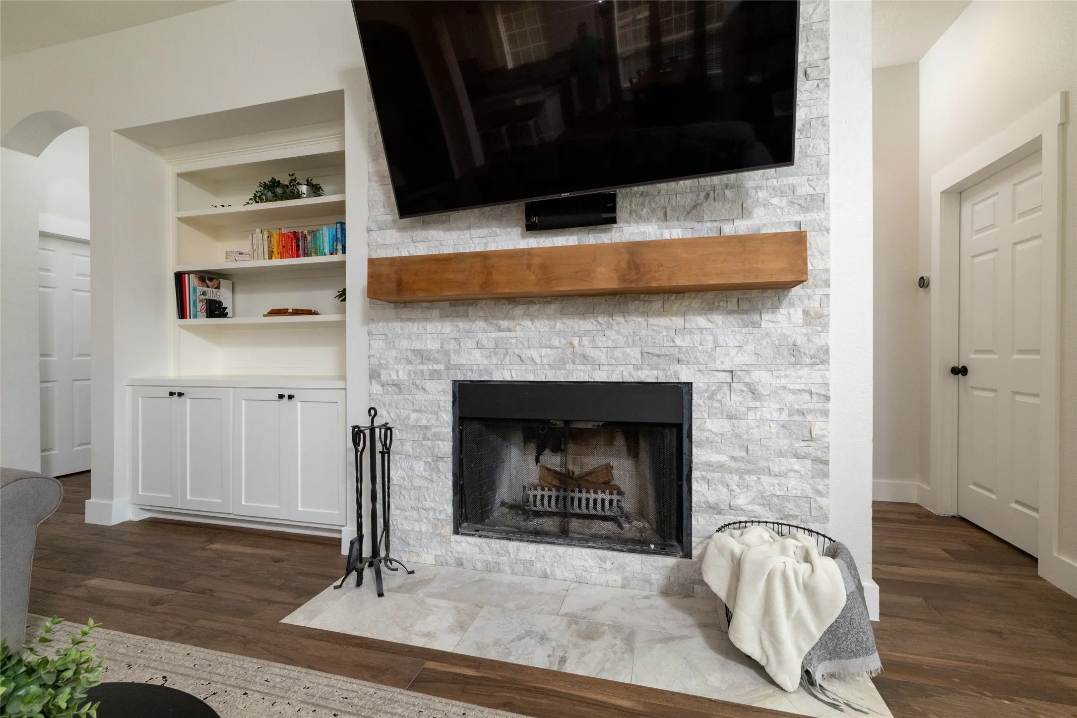 Fireplace and door to Primary Bedroom