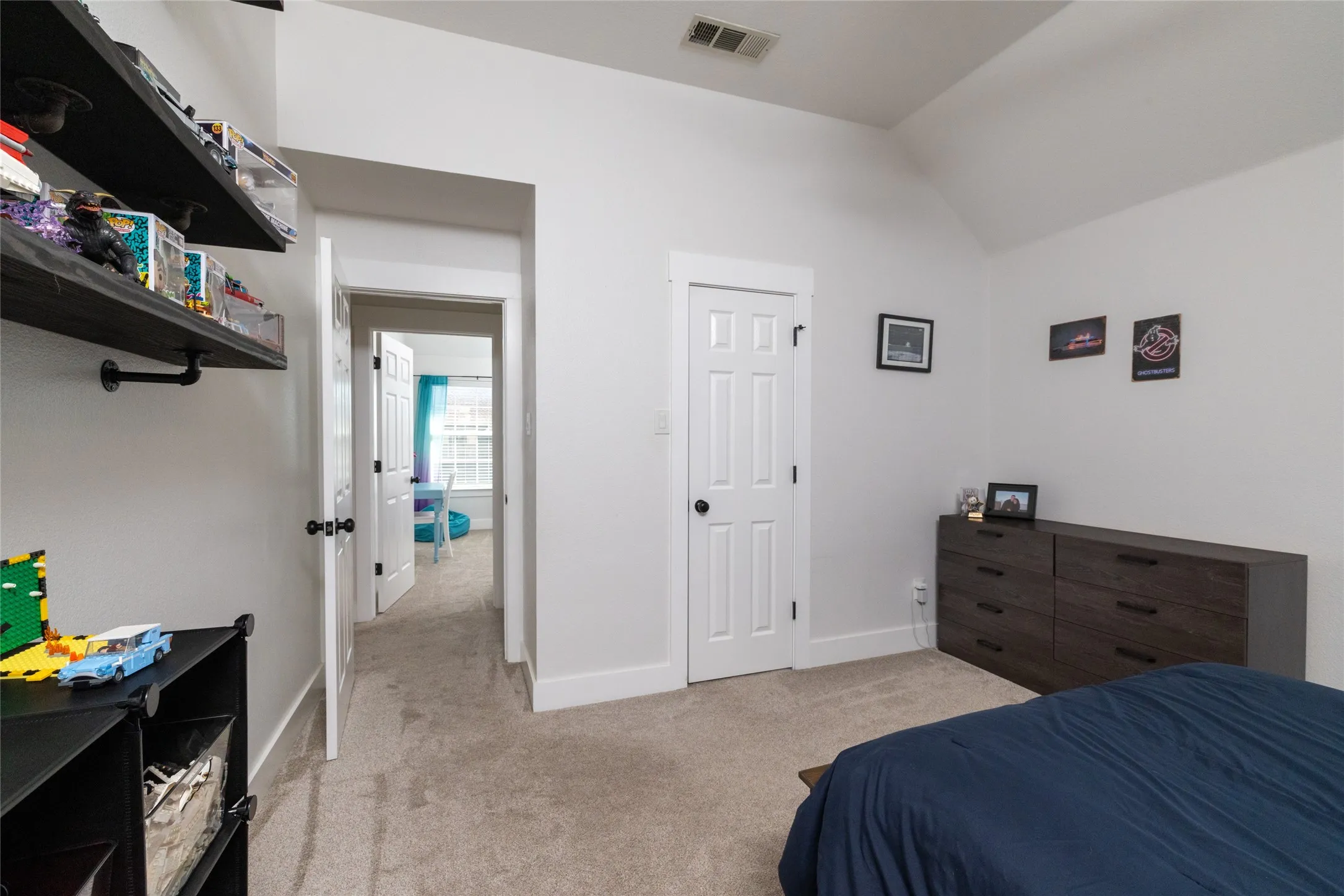 Bedroom 3 with view of walk in closet and bedroom 4