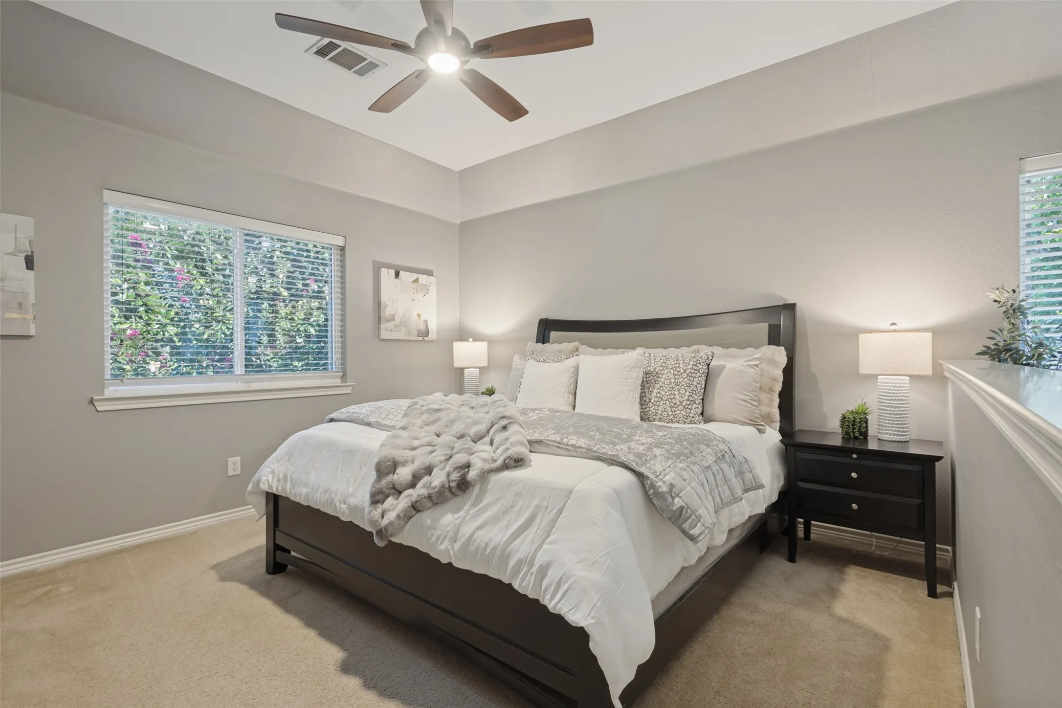The nook for a king sized bed, night tables and dressers next to the sitting area makes this an exceptional retreat.