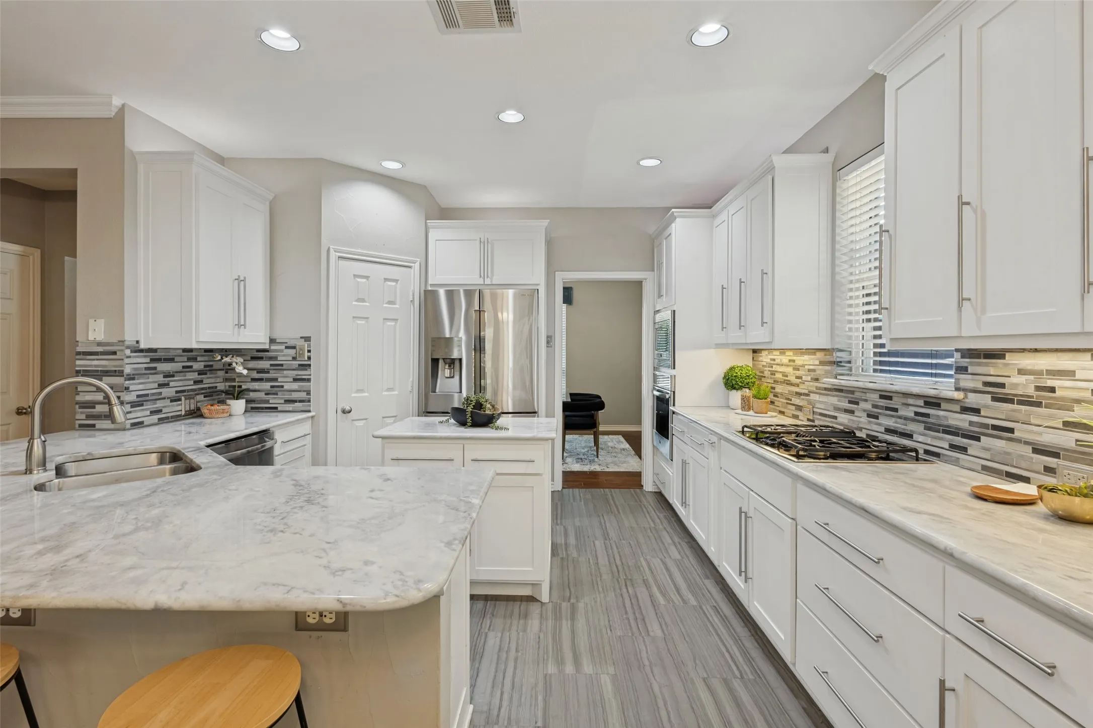 the kitchen flows though to the flex room.