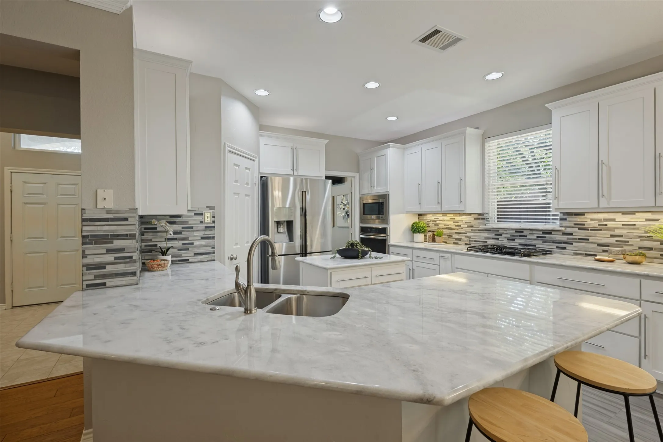 A large breakfast bar allows for casual dining.