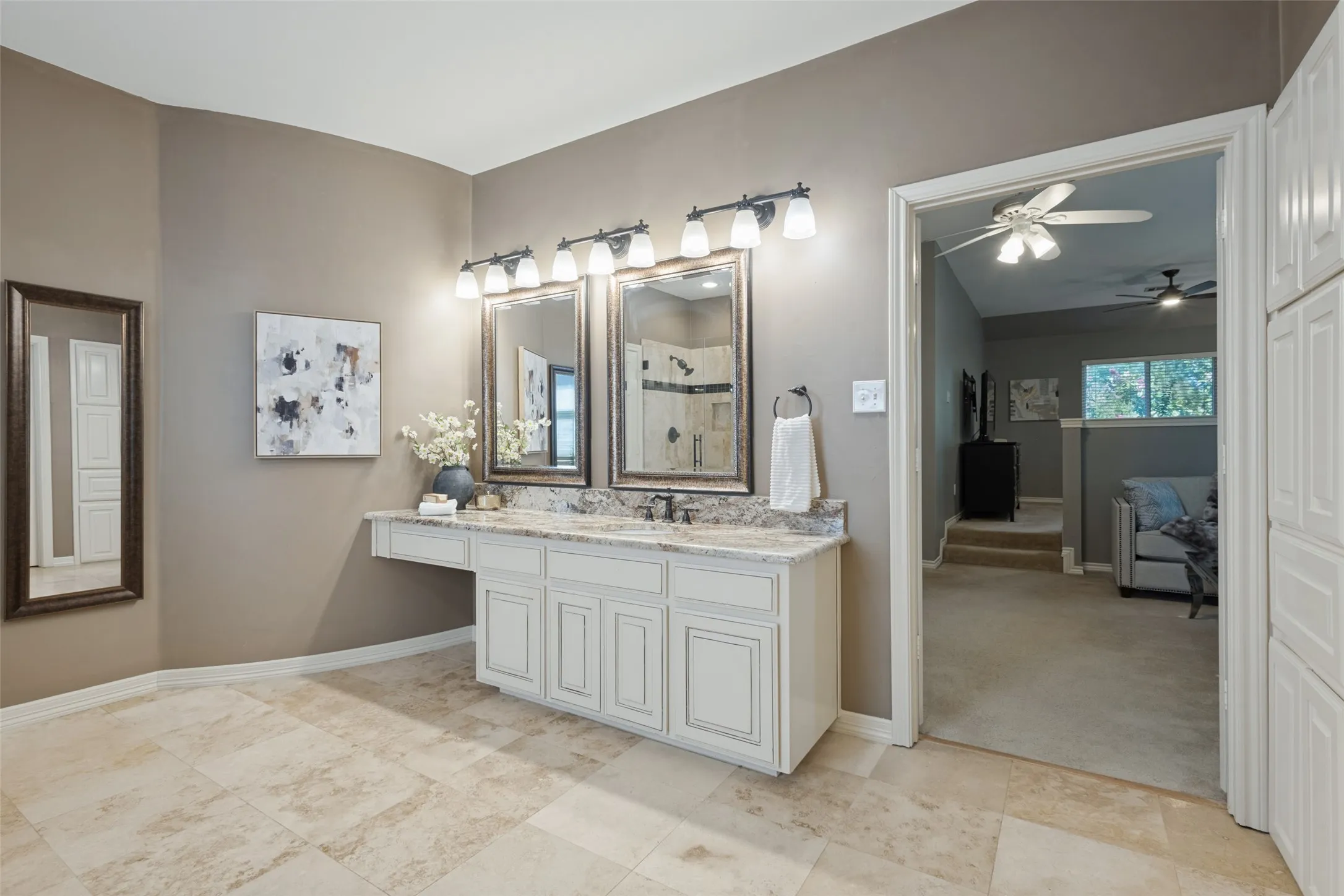 The vanities in the primary bath are separate.