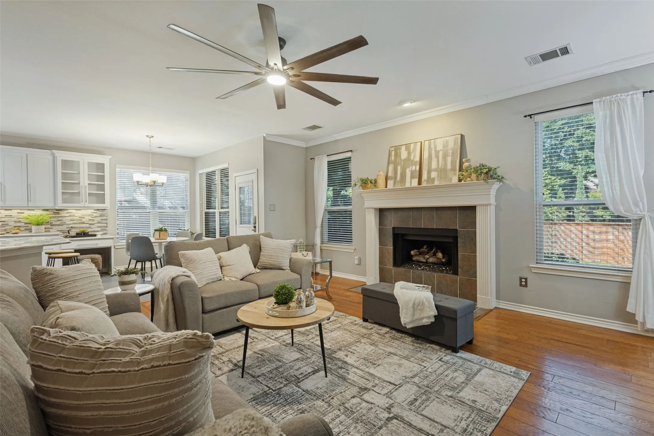The living room features a gas log fireplace for easy ambience on winter nights.